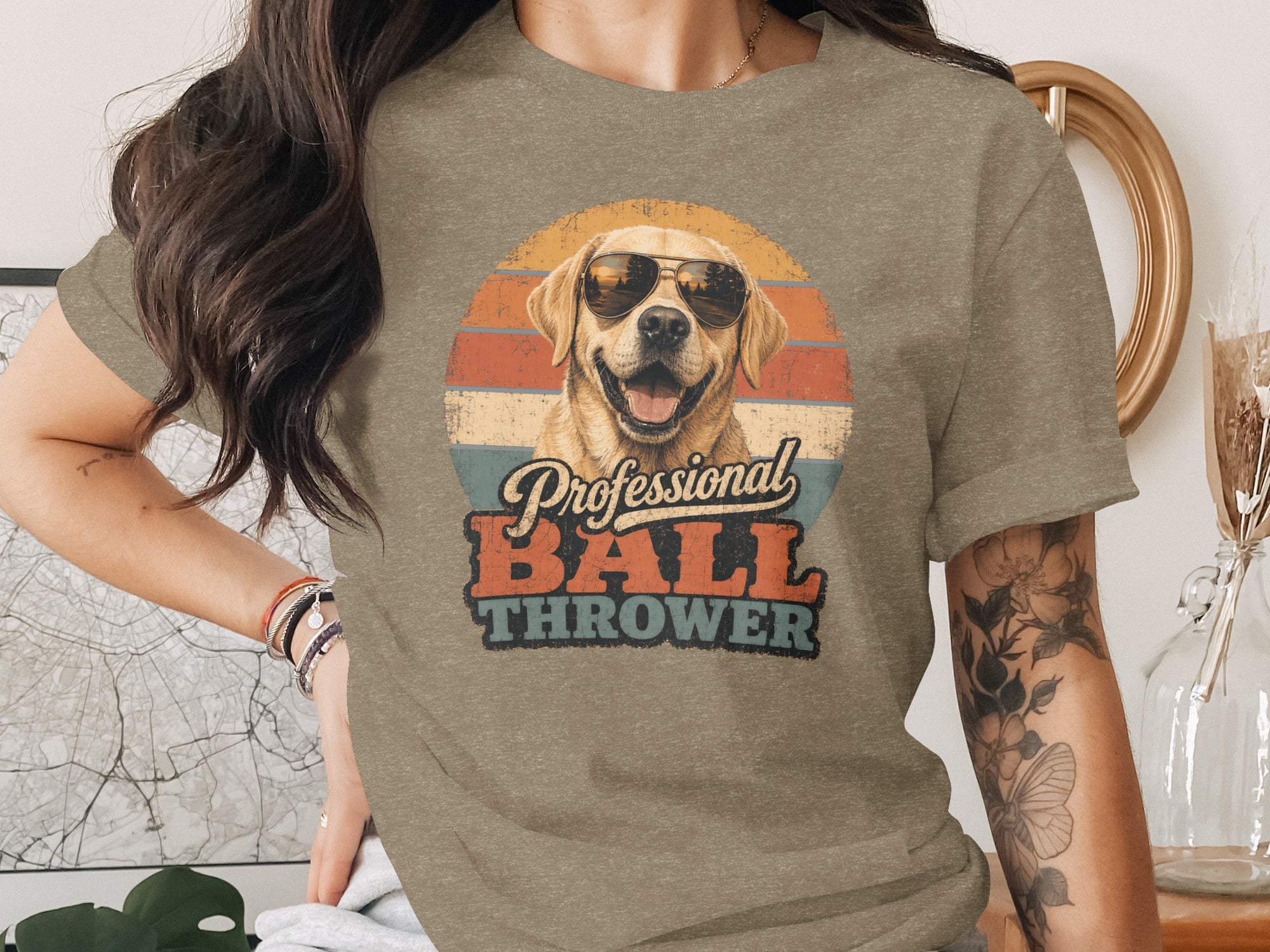 Labrador wearing sunglasses with text "Professional BALL THROWER"