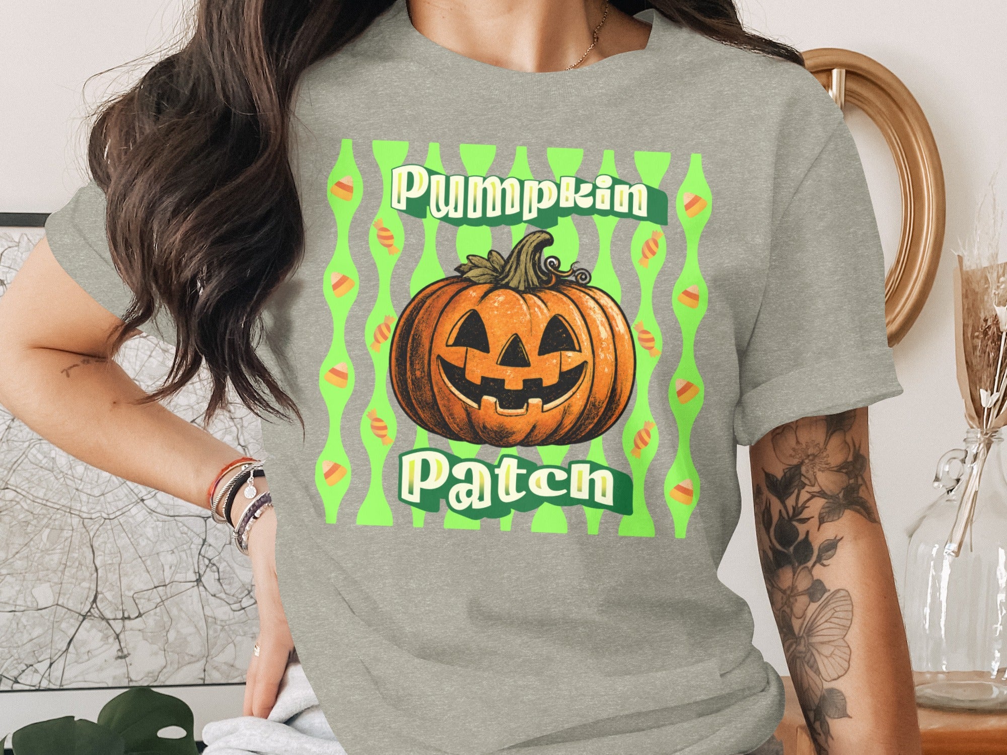 Grey t-shirt with "Pumpkin Patch" text and a jack-o-lantern design.