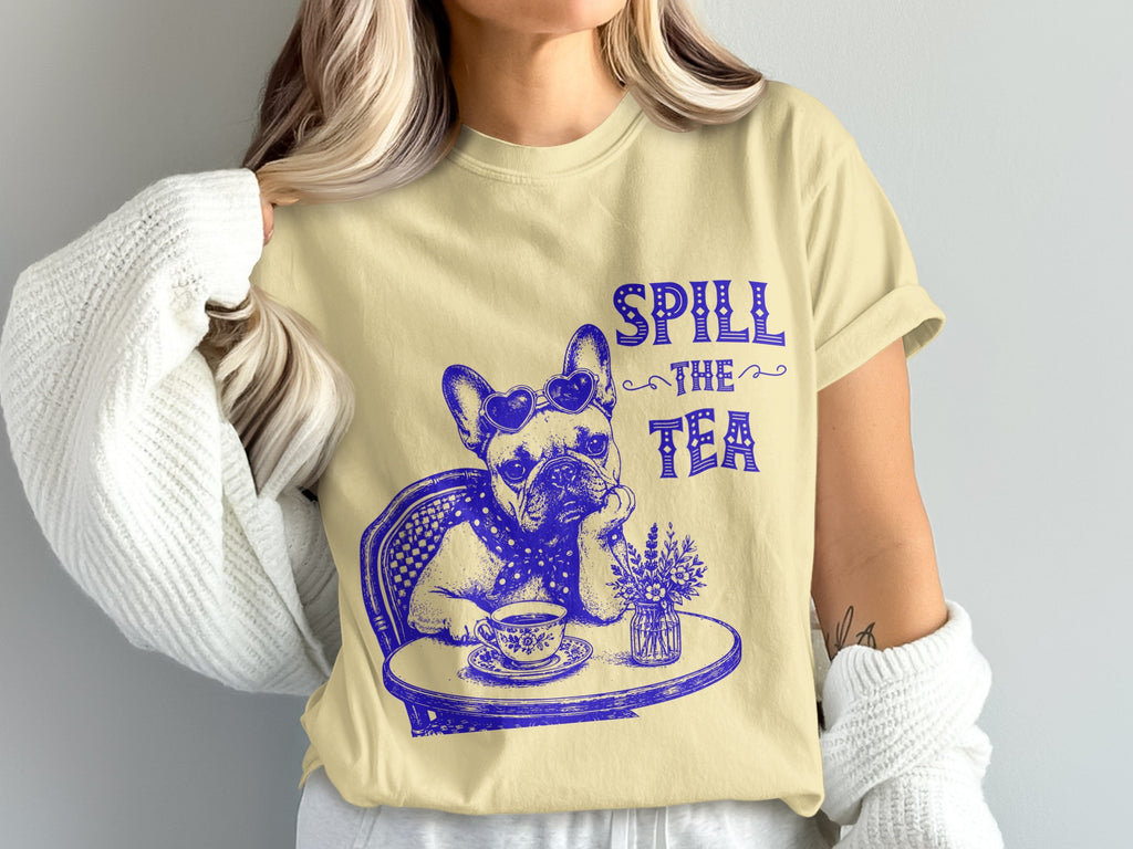 French bulldog wearing heart sunglasses with "Spill the Tea" text.