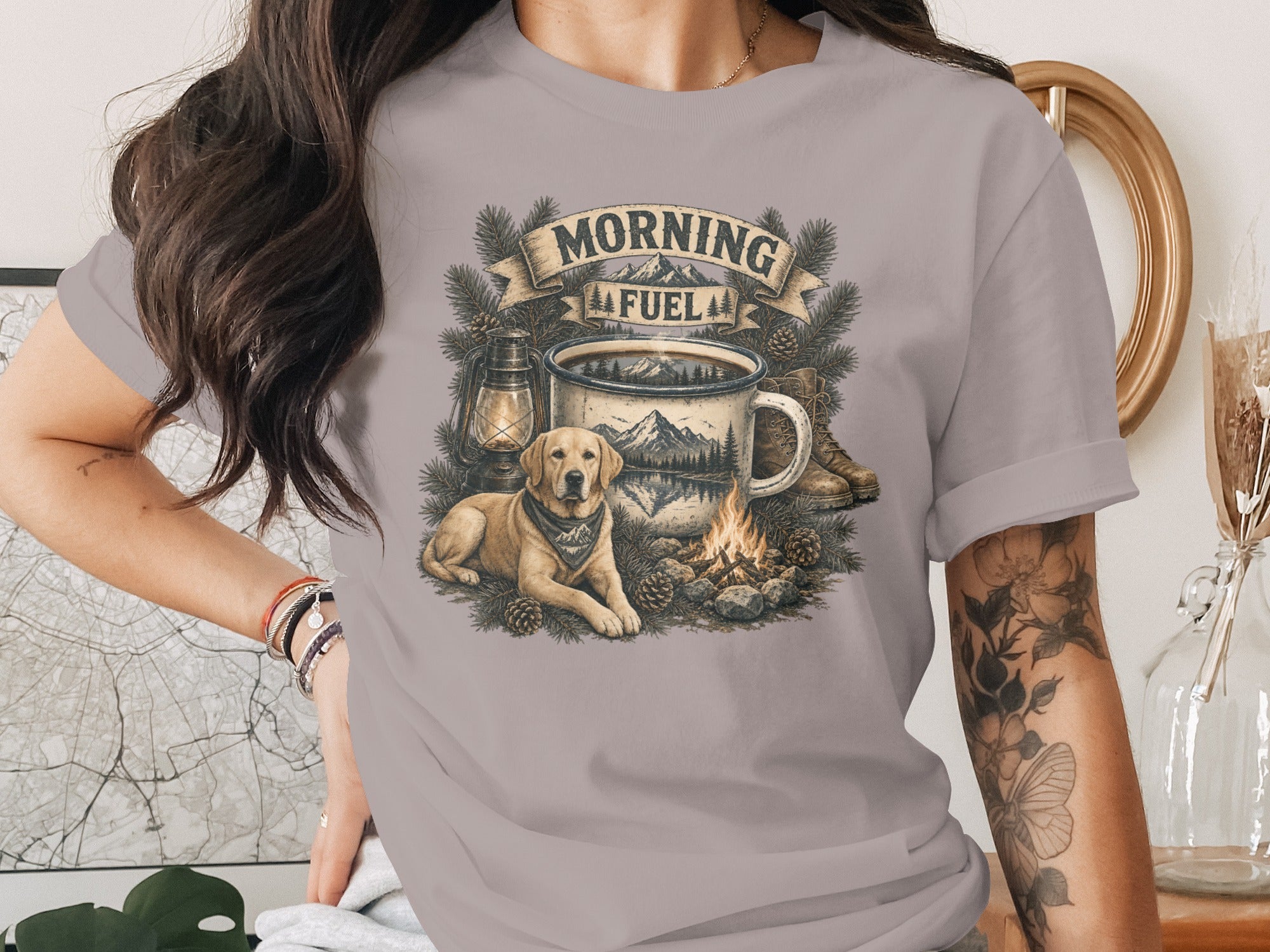 T-shirt graphic with dog, coffee mug, campfire, and text "Morning Fuel".
