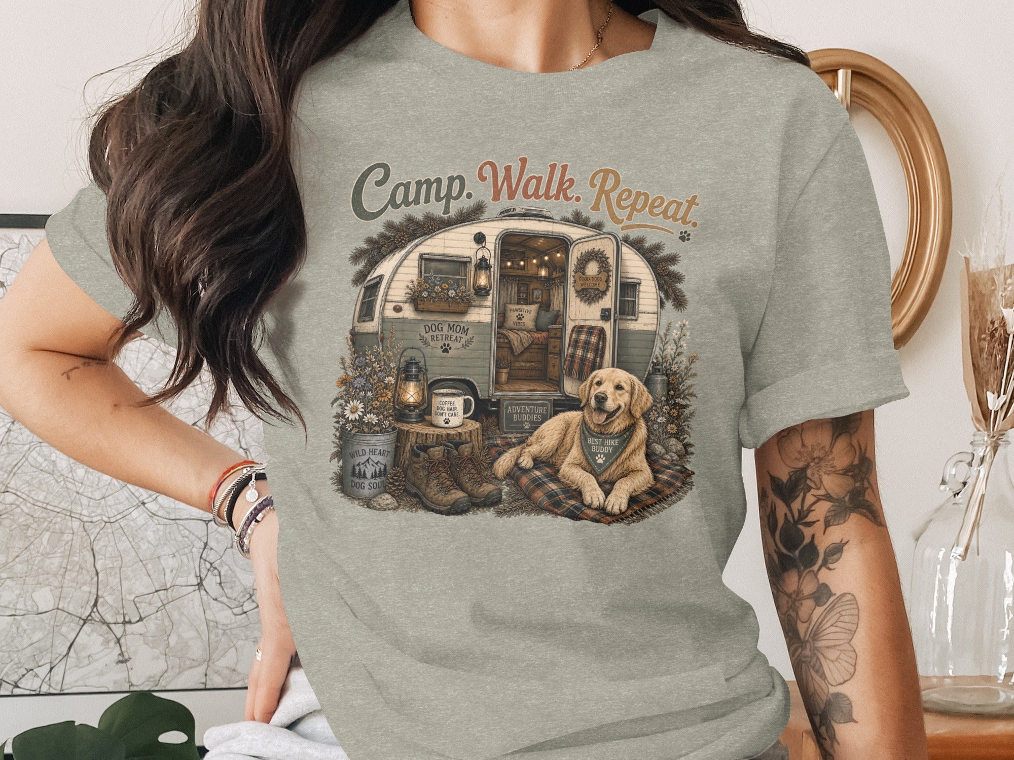 Camp. Walk. Repeat graphic with dog, trailer, and text.