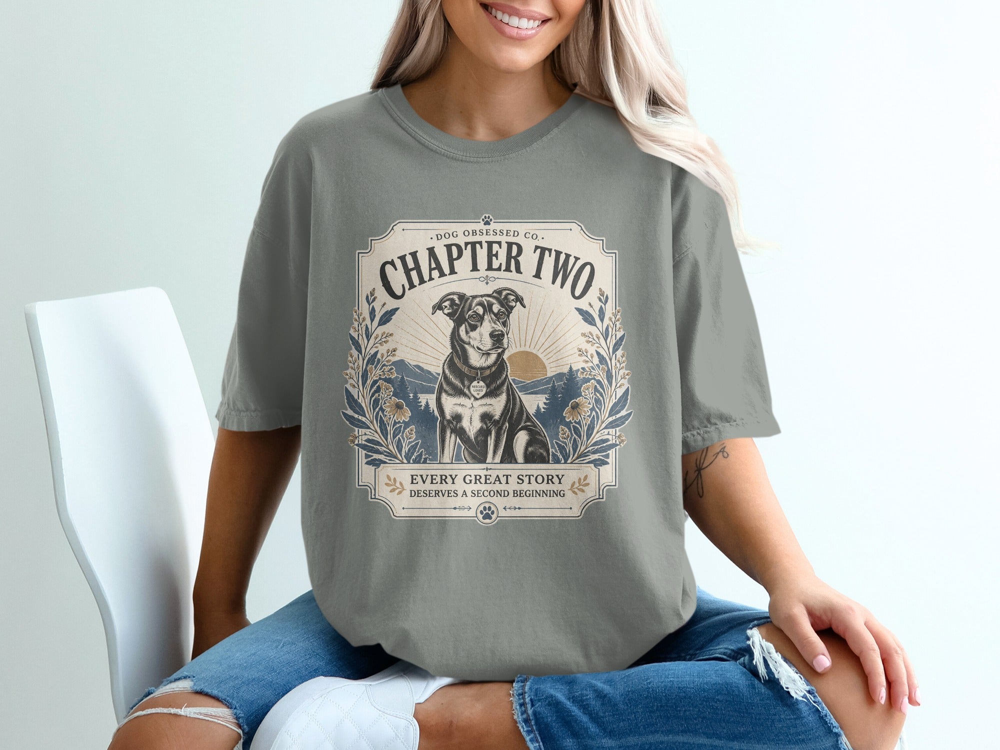 Grey t-shirt features dog graphic and text: Chapter Two, Dog Obsessed Co., and Every Great Story Deserves a Second Beginning.