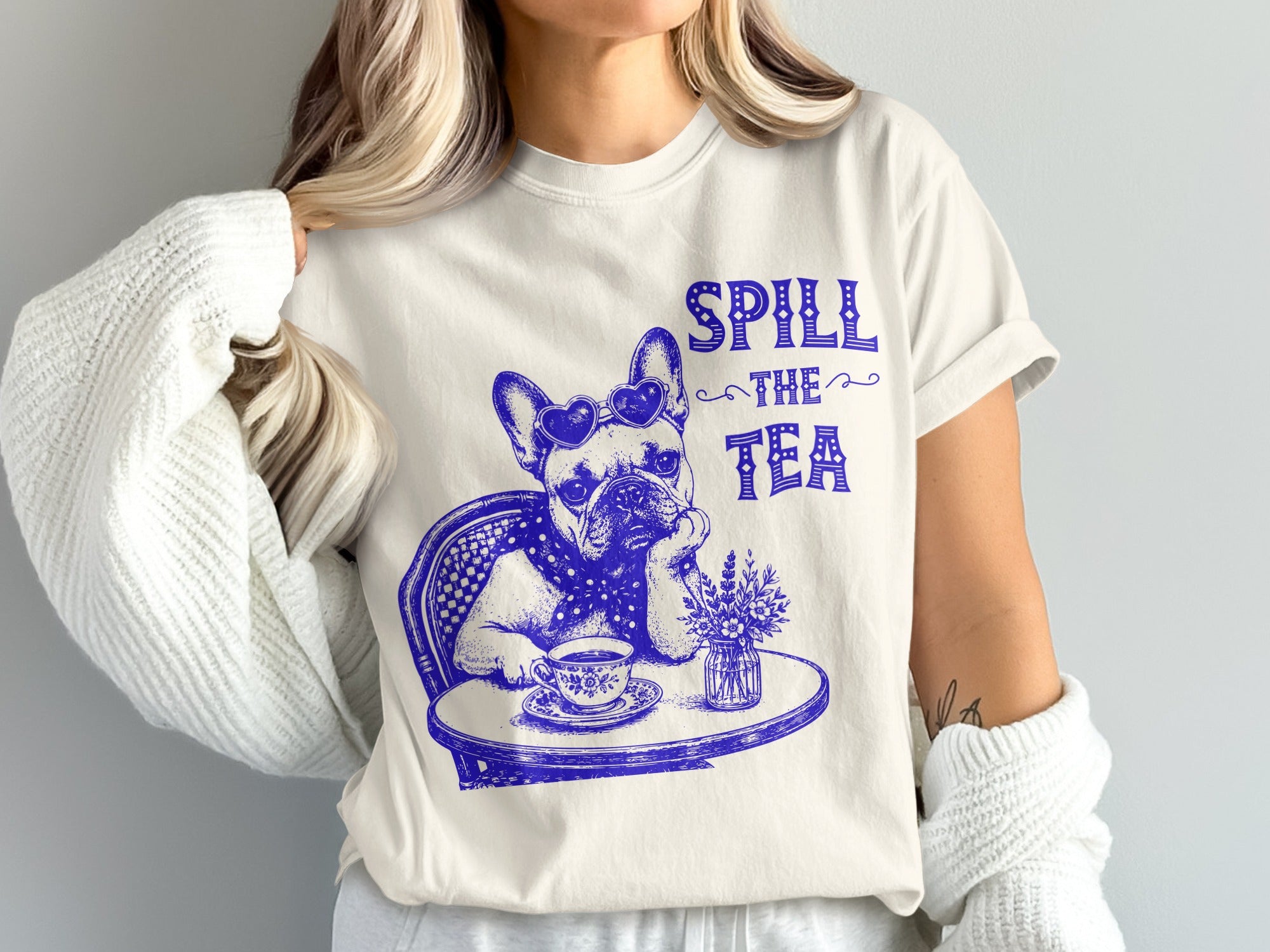French bulldog wearing heart sunglasses with text "Spill the Tea"