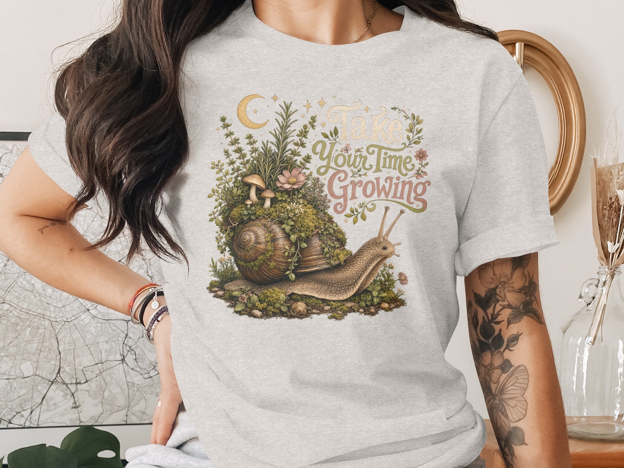 Snail with overgrown shell and text "Take Your Time Growing."