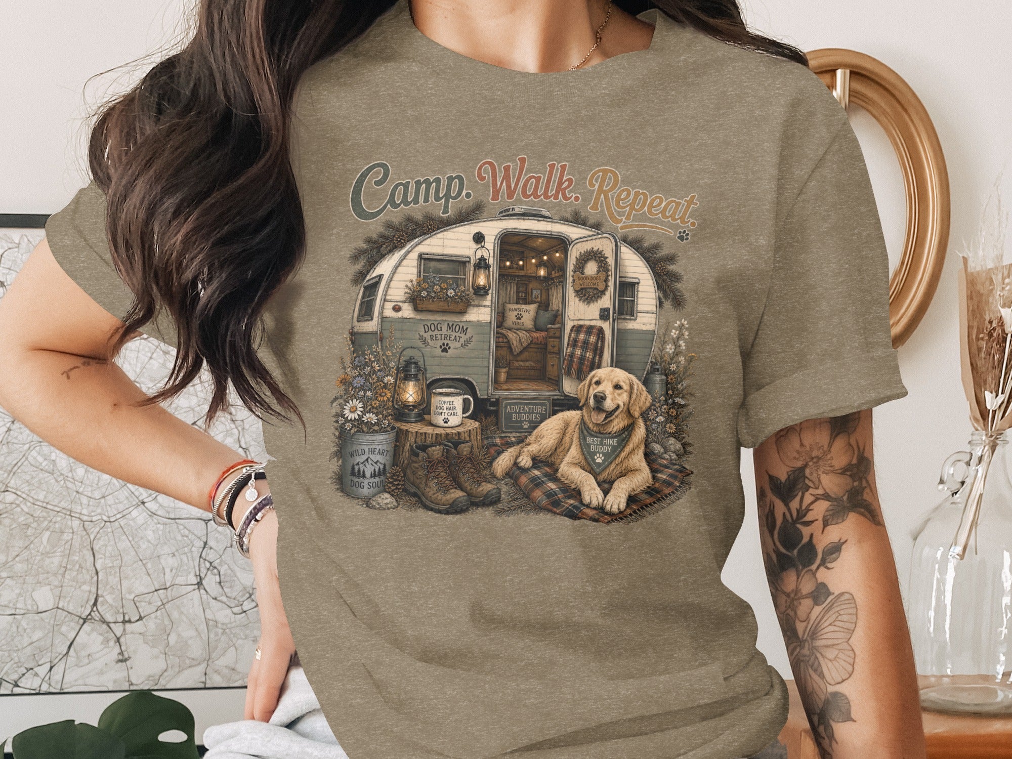 Graphic tee with "Camp. Walk. Repeat." text and a dog by a camper.