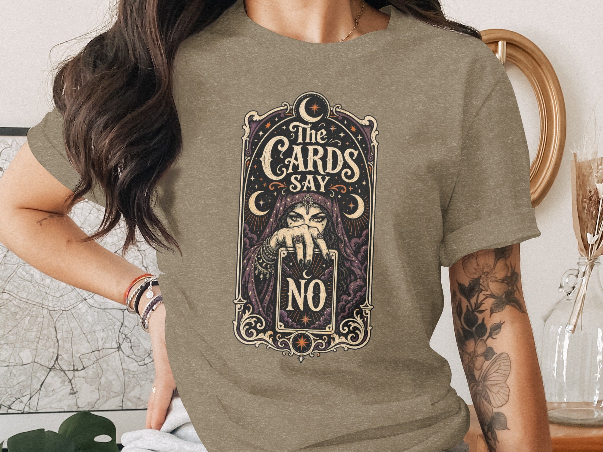 The Cards Say No graphic on a heathered taupe t-shirt.