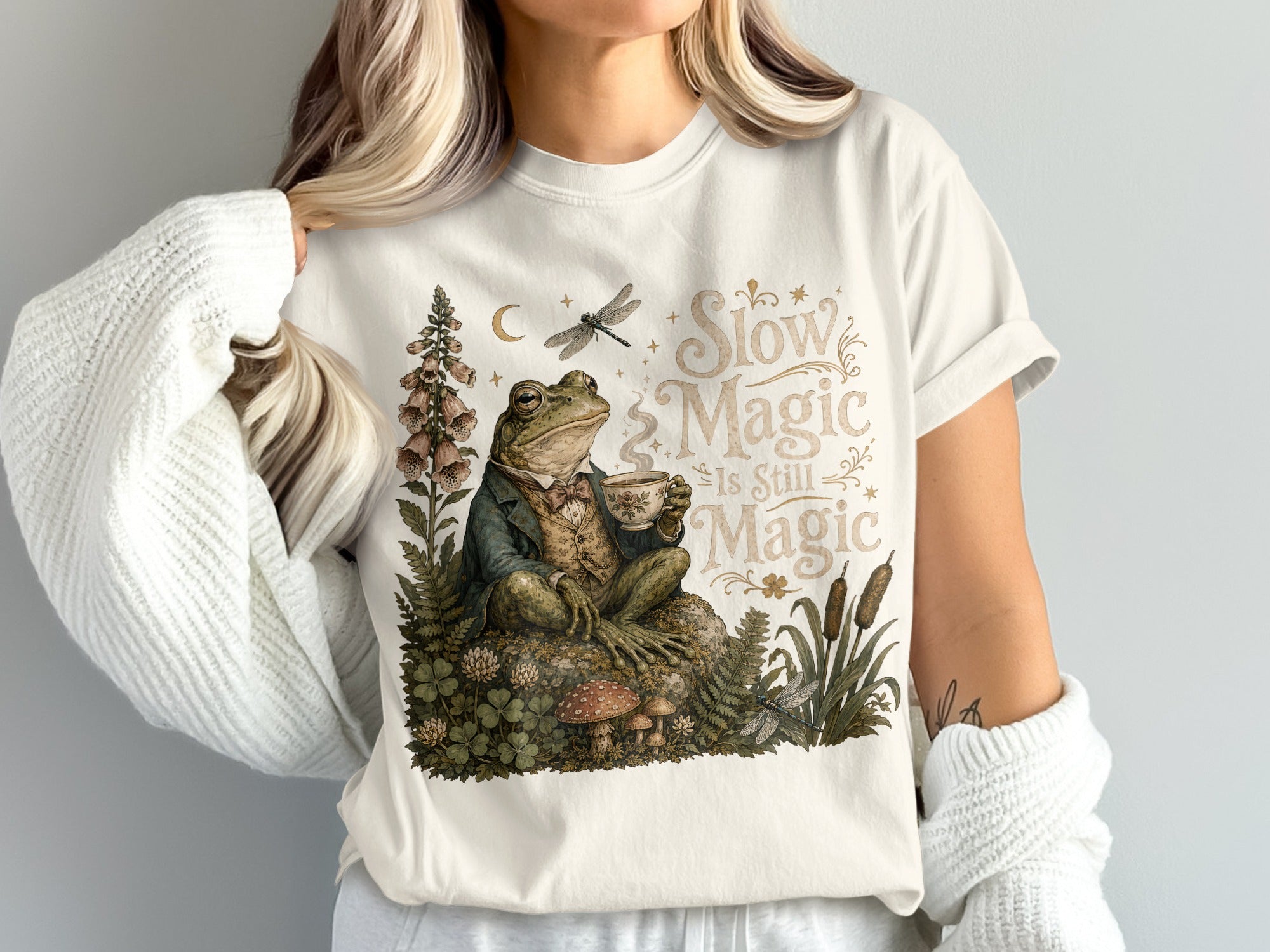 Frog drinking tea with "Slow Magic Is Still Magic" text.