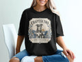 Black t-shirt with "Chapter Two" and a dog in a scenic emblem.