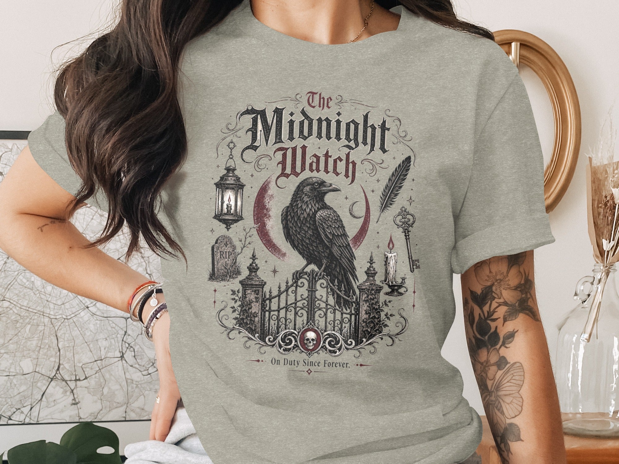 Grey t-shirt with "The Midnight Watch" and raven on a gate graphic.