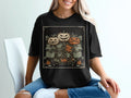 Black t-shirt with three carved pumpkins and botanicals, reading "Trick or Treat Botanical Society."