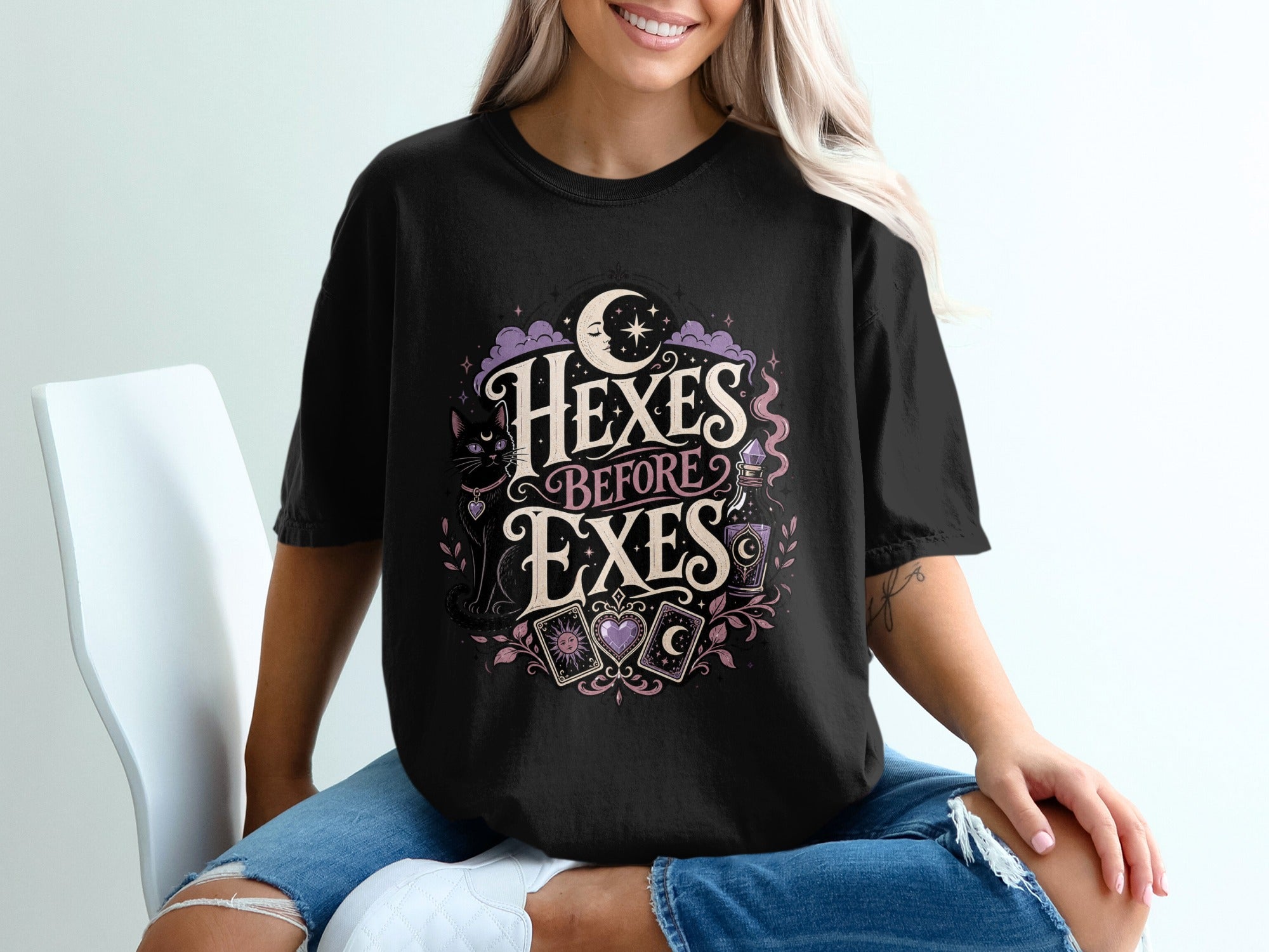Black t-shirt with "Hexes Before Exes" graphic featuring a cat and moon.