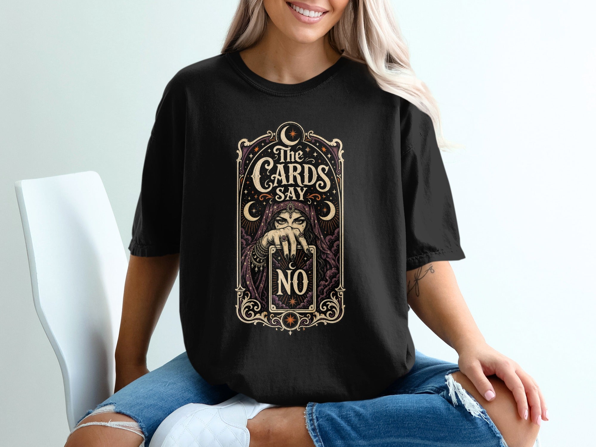 Black t-shirt with a fortune teller design saying "The Cards Say No."