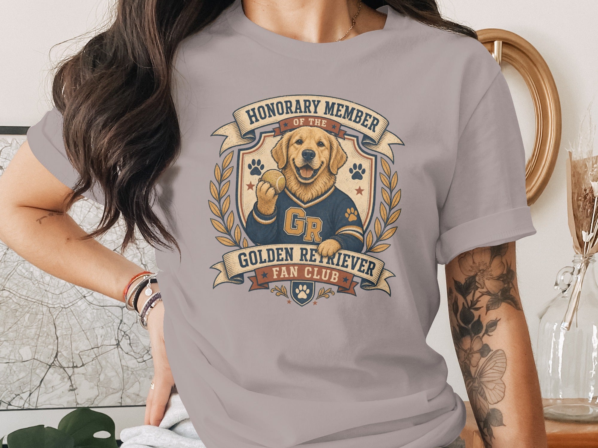 Golden Retriever wearing a jersey and holding a ball, "Honorary Member of the Golden Retriever Fan Club"