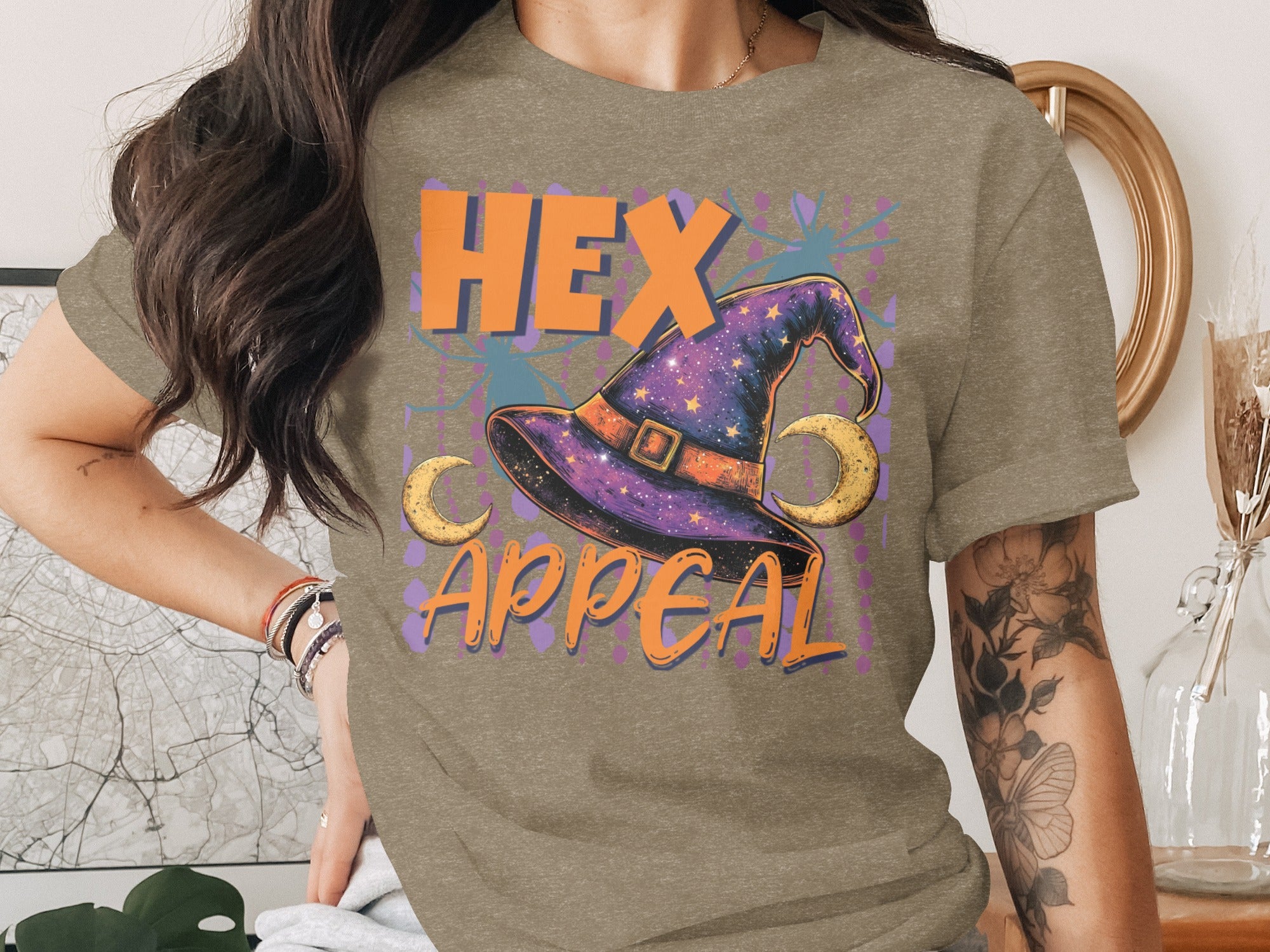 T-shirt graphic with "HEX Appeal" text, witch hat, and crescent moons.