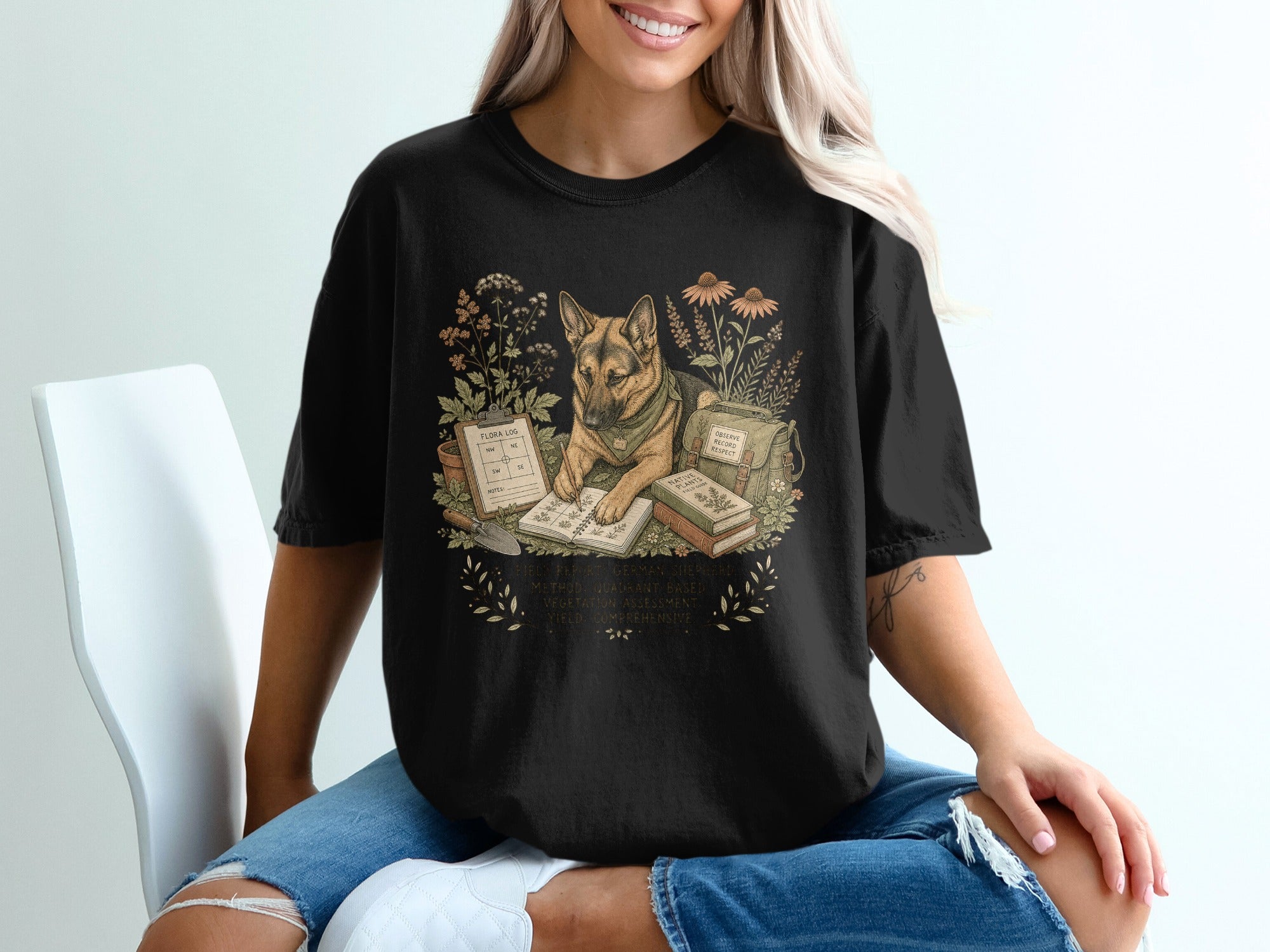German Shepherd with flora log, books, and gardening tools, observing plants.