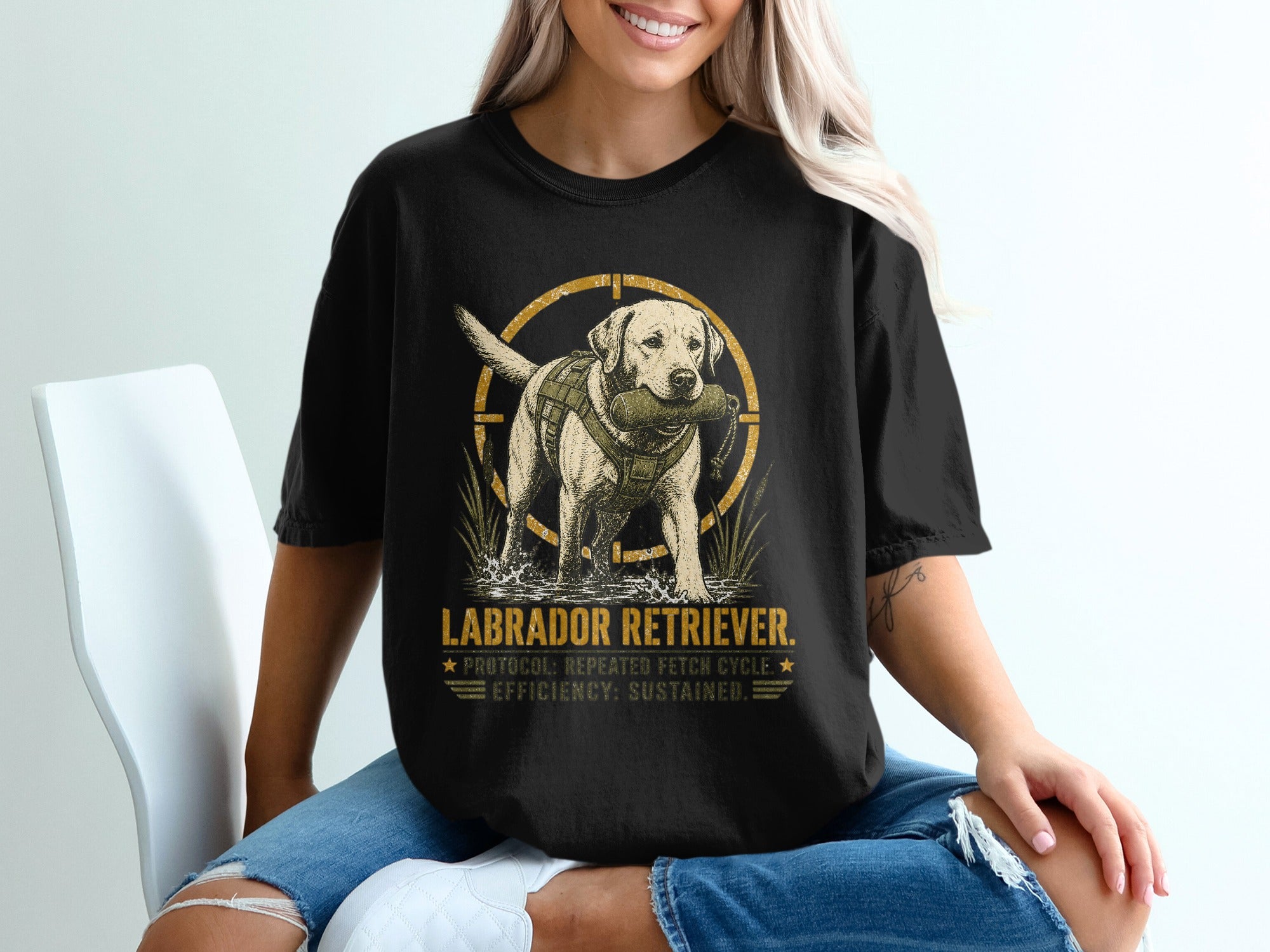 Labrador Retriever design with dog holding retrieving dummy and text.
