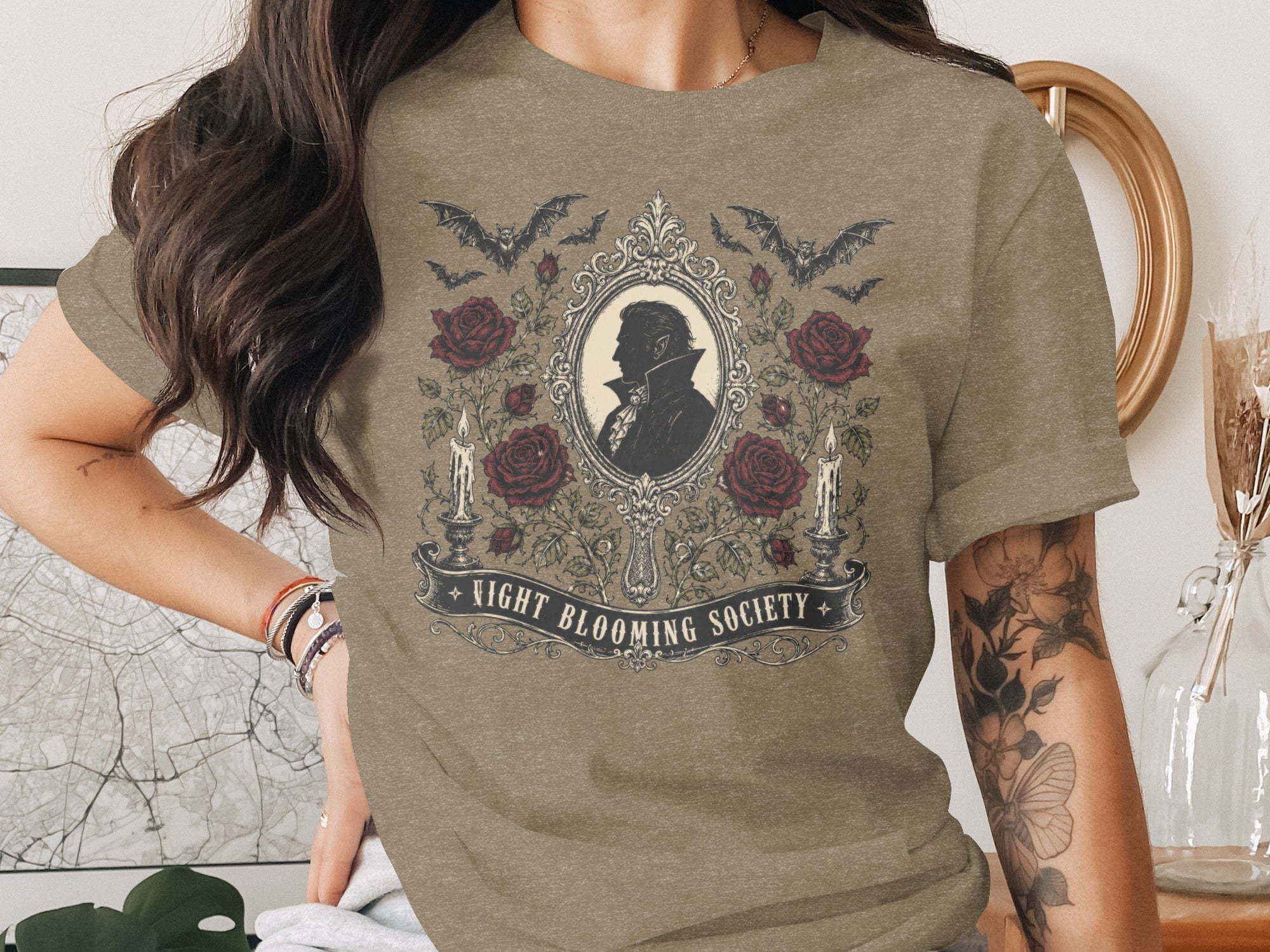 T-shirt with vampire silhouette, roses, bats, candles, and text "Night Blooming Society".