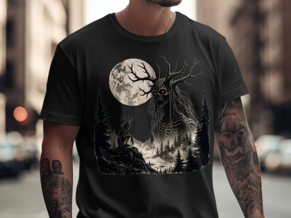 Black t-shirt with a dark forest scene featuring a creature and a large moon.