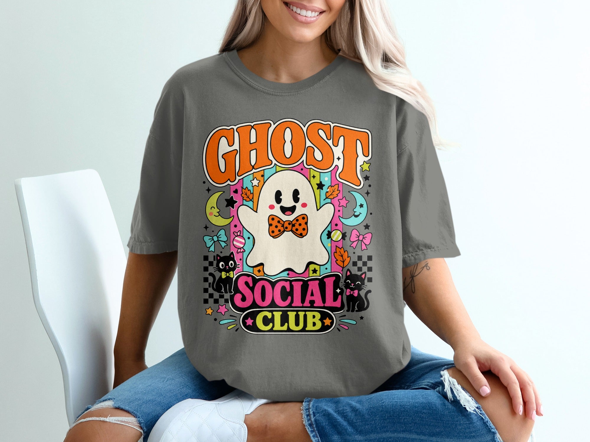 Ghost Social Club graphic with cartoon ghost, cats, moons, and stars.