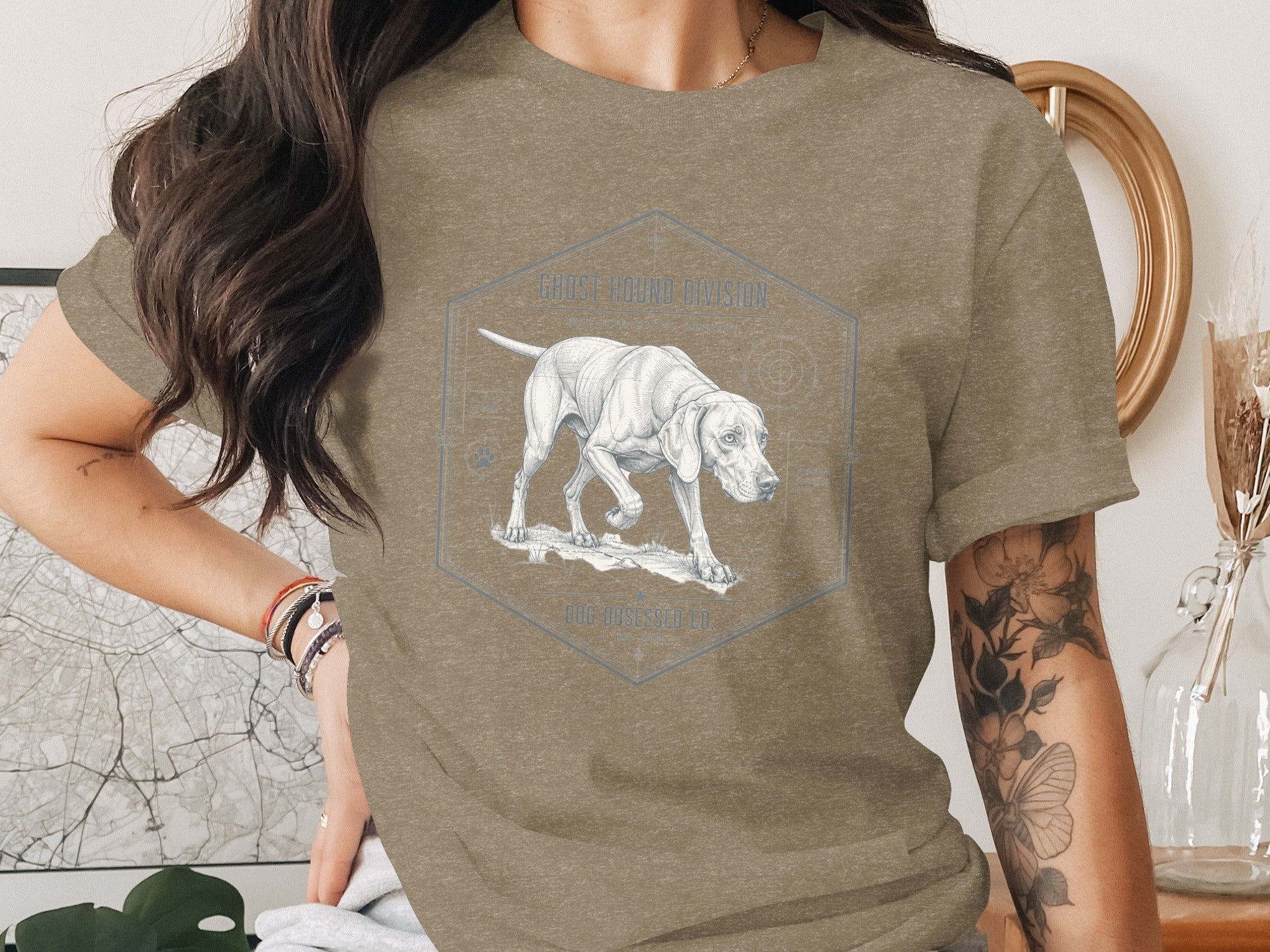 T-shirt with a drawing of a pointer dog inside a hexagon with text "GHOST HOUND DIVISION".