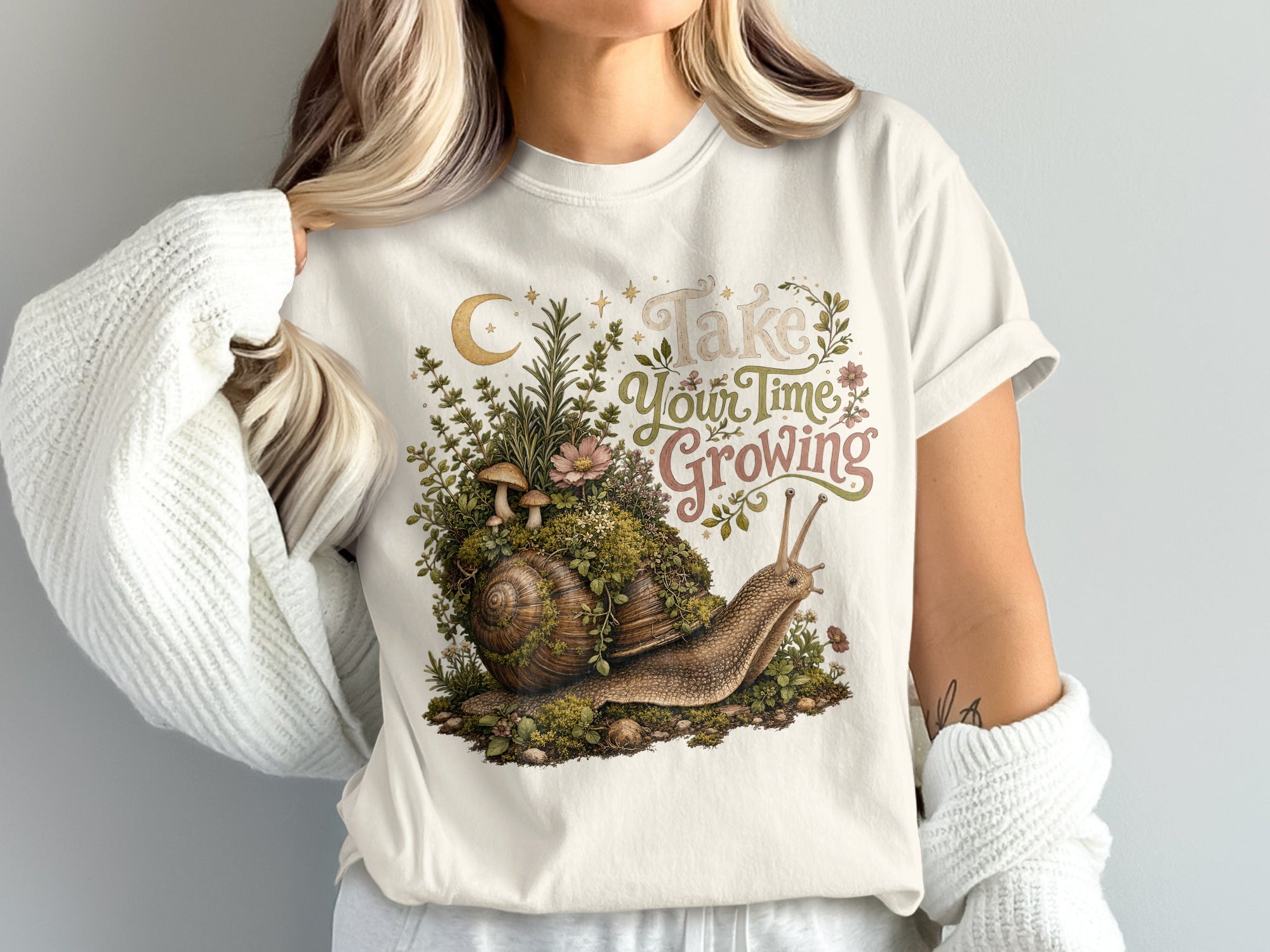 Snail with mossy shell, mushrooms, flowers, and text "Take Your Time Growing"