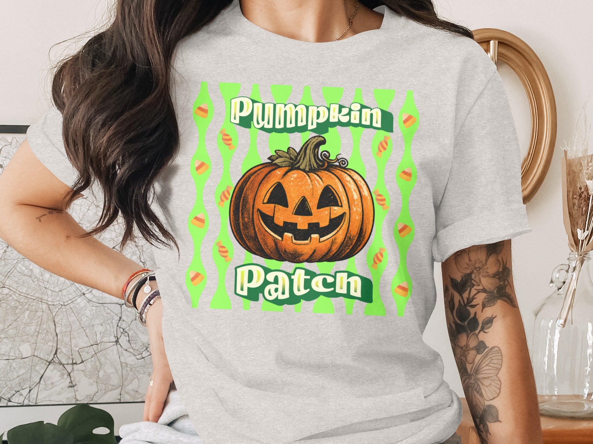 Gray t-shirt with a jack-o'-lantern graphic and text "Pumpkin Patch".