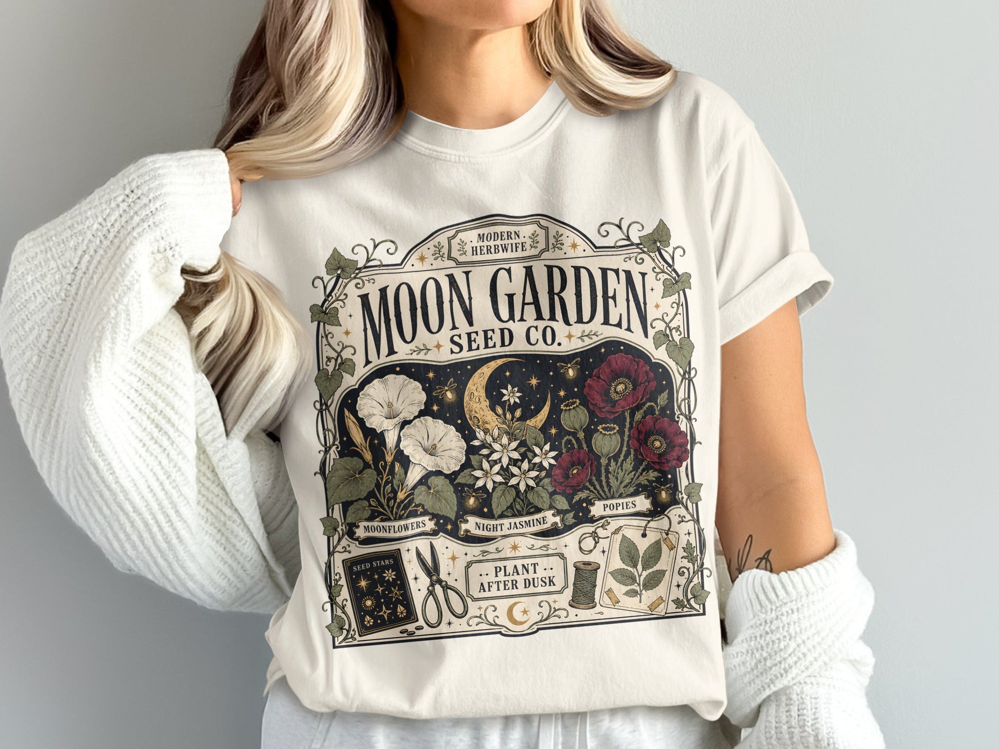Moon Garden Seed Co. t-shirt with floral, moon and celestial design.