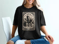Black t-shirt with "The Dog Parent" tarot card design featuring dogs and moons.