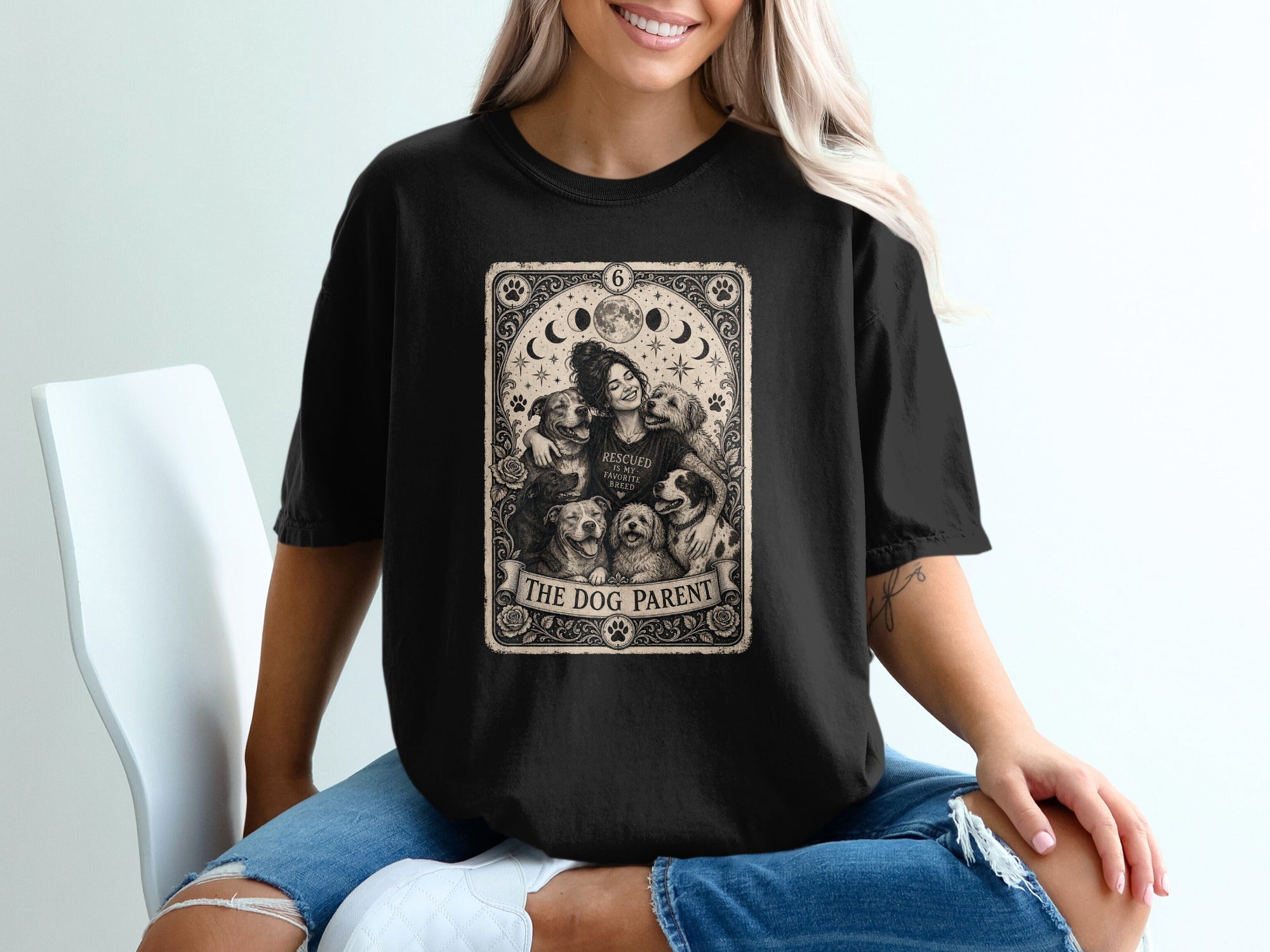 Black t-shirt with "The Dog Parent" tarot card design featuring dogs and moons.