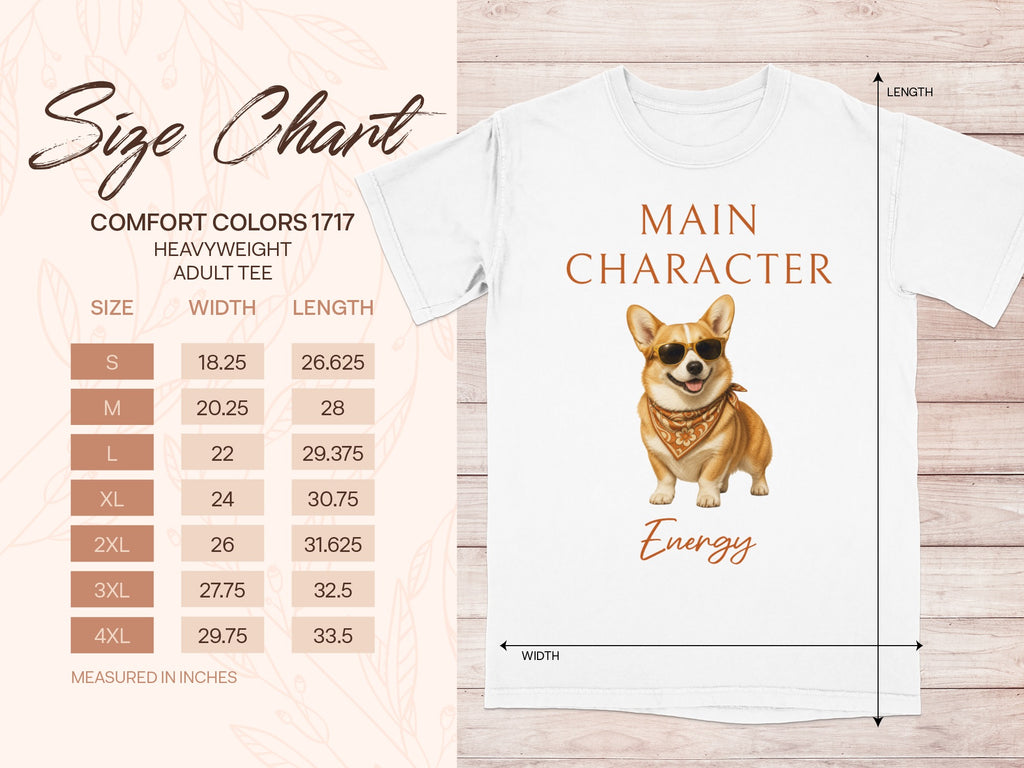 White t-shirt with "MAIN CHARACTER Energy" and corgi graphic. Size chart included.
