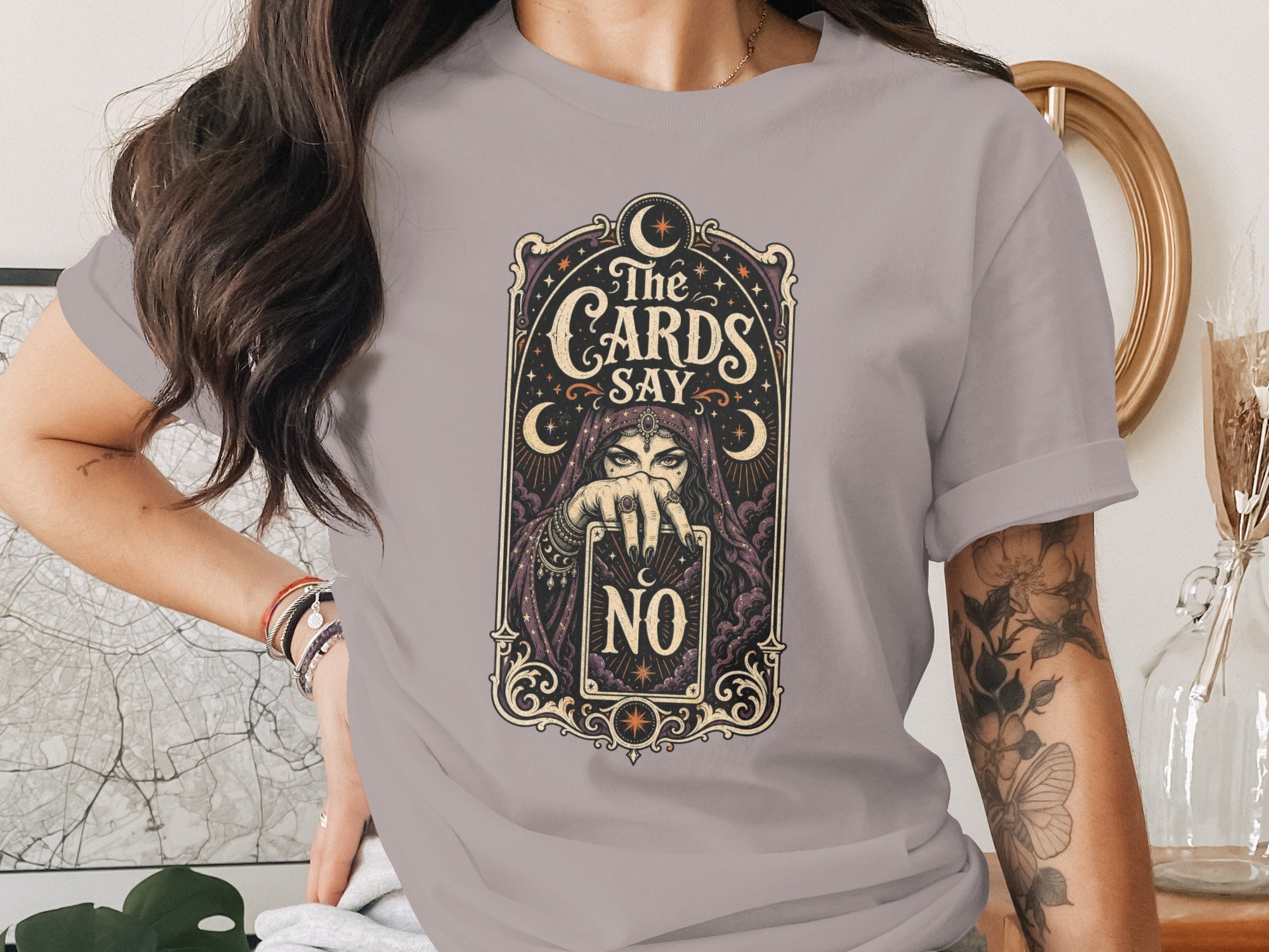 T-shirt graphic of a tarot reader with the words "The Cards Say No".