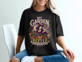 Black t-shirt with "My Garden is Better Company" text and witch graphic.
