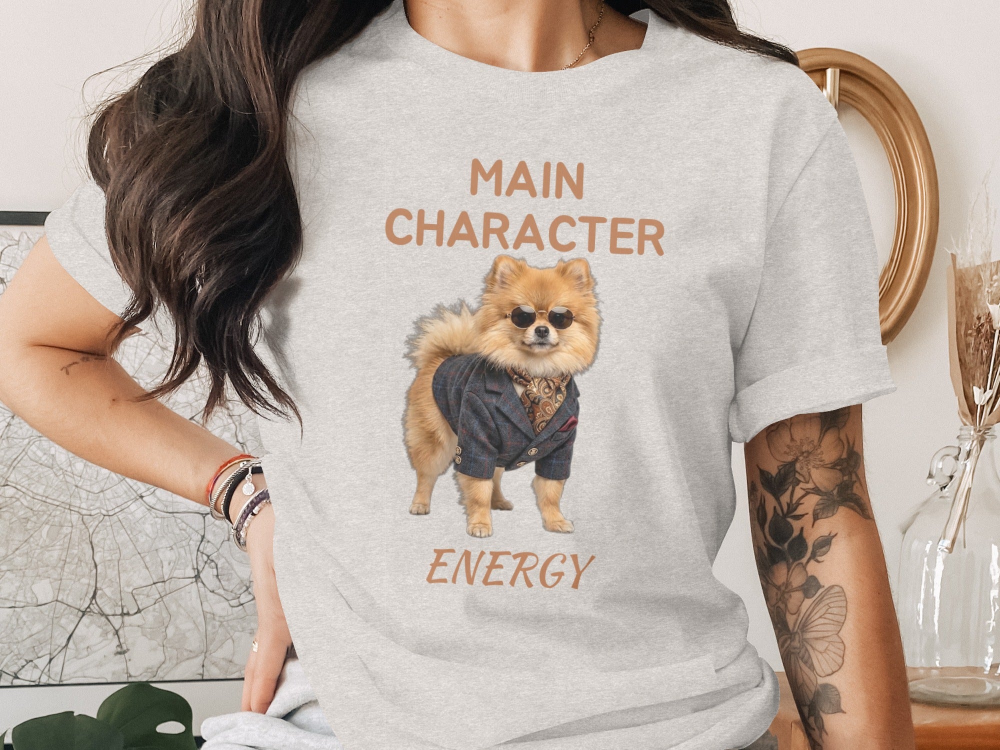 Light gray t-shirt with "MAIN CHARACTER ENERGY" and a dog in a suit.
