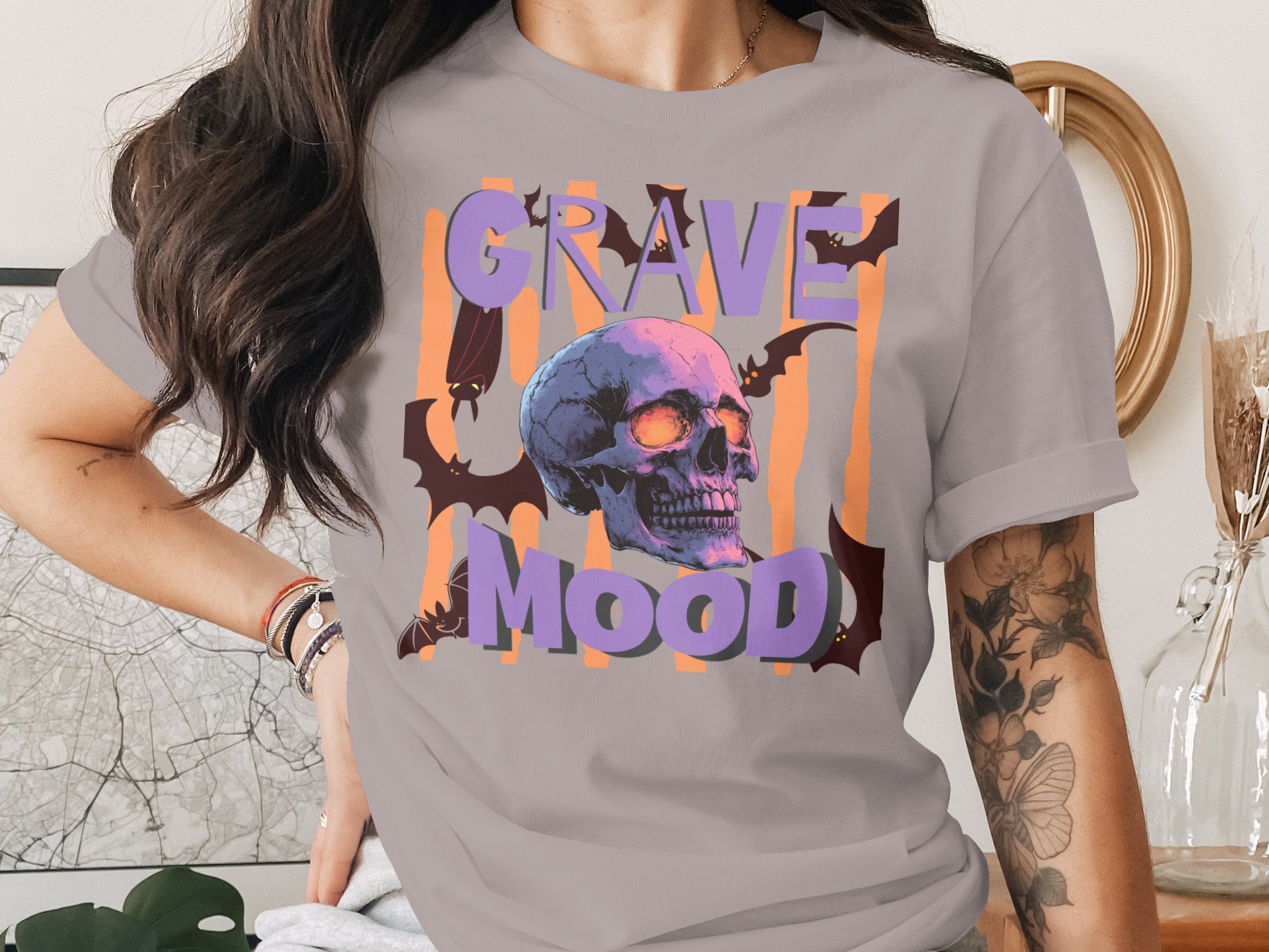 Grave Mood graphic on grey t-shirt with skull and bats.