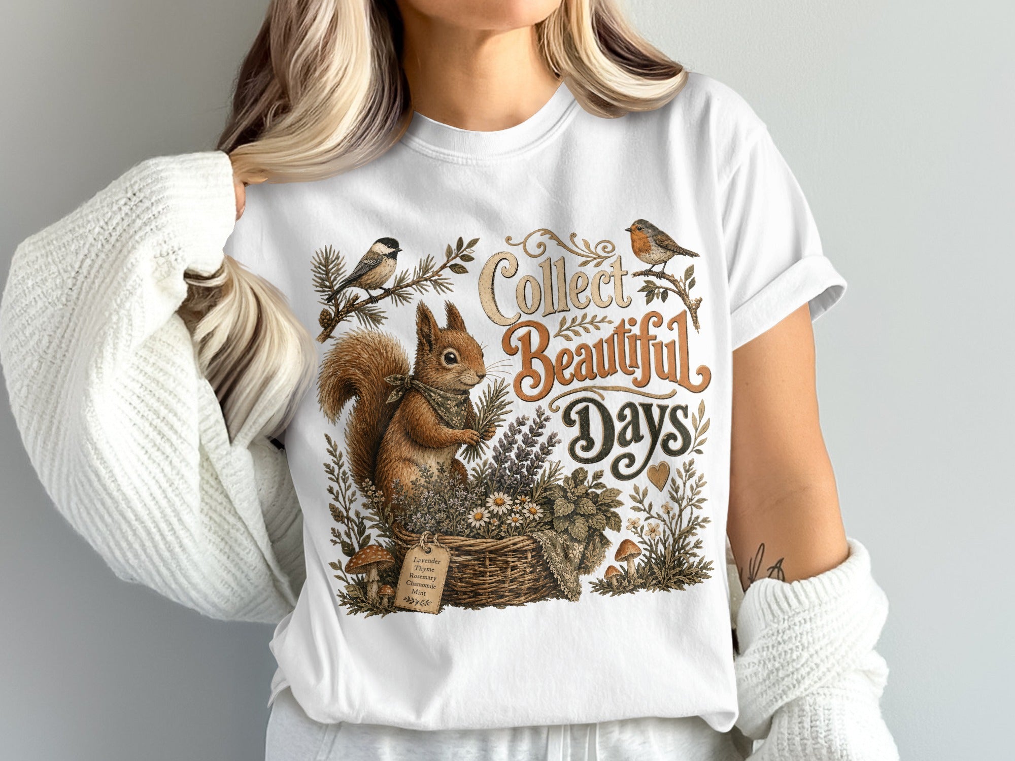 White t-shirt graphic with squirrel, birds, and "Collect Beautiful Days" text.