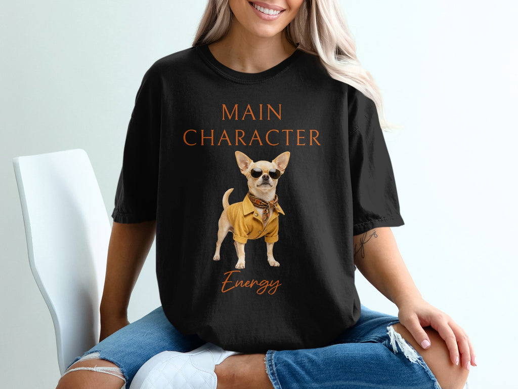 Black t-shirt with "Main Character Energy" text and chihuahua graphic.