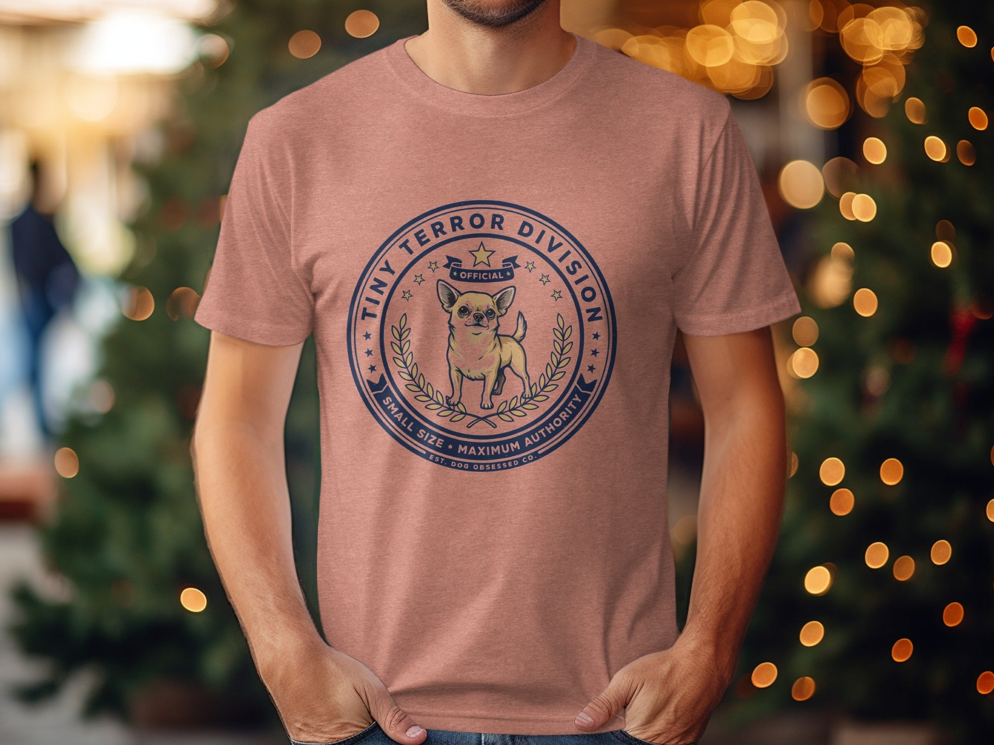 Salmon t-shirt with "Tiny Terror Division Small Size Maximum Authority" design.