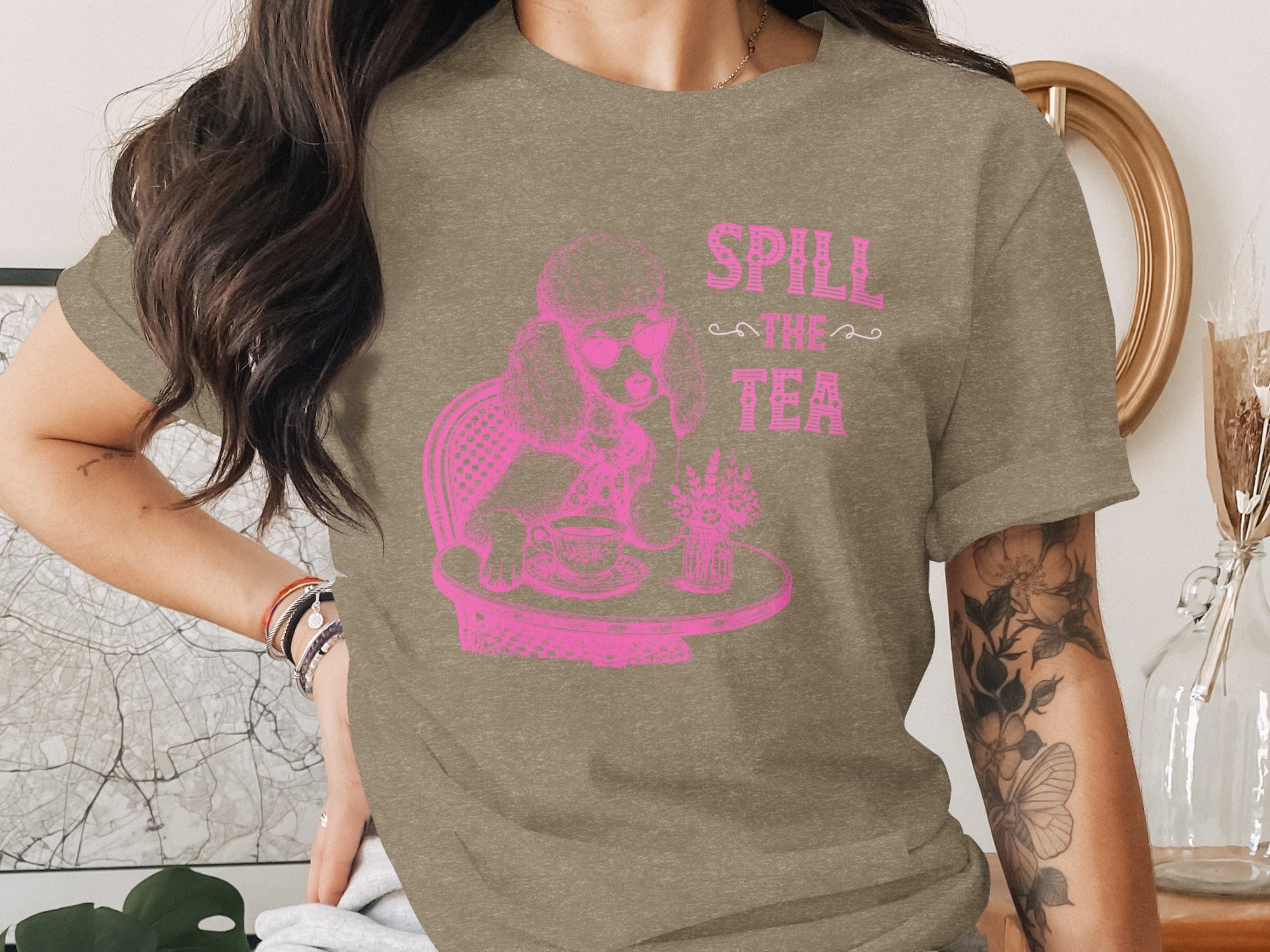Pink poodle in sunglasses spills tea with text "SPILL THE TEA".