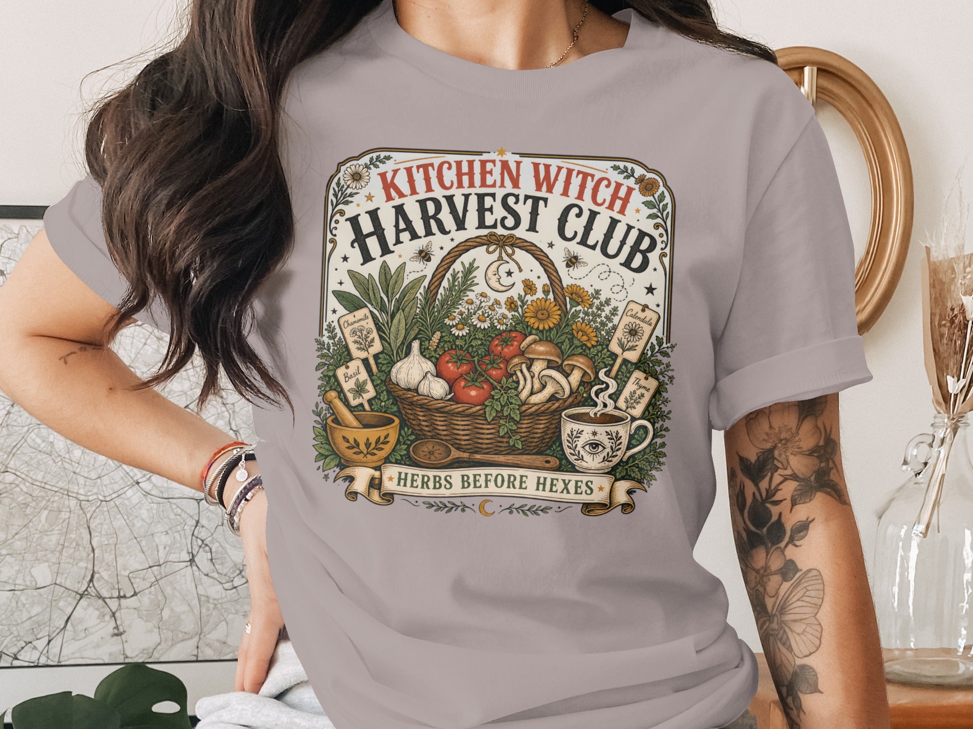 Kitchen Witch Harvest Club graphic with a basket of produce and the text "Herbs Before Hexes".