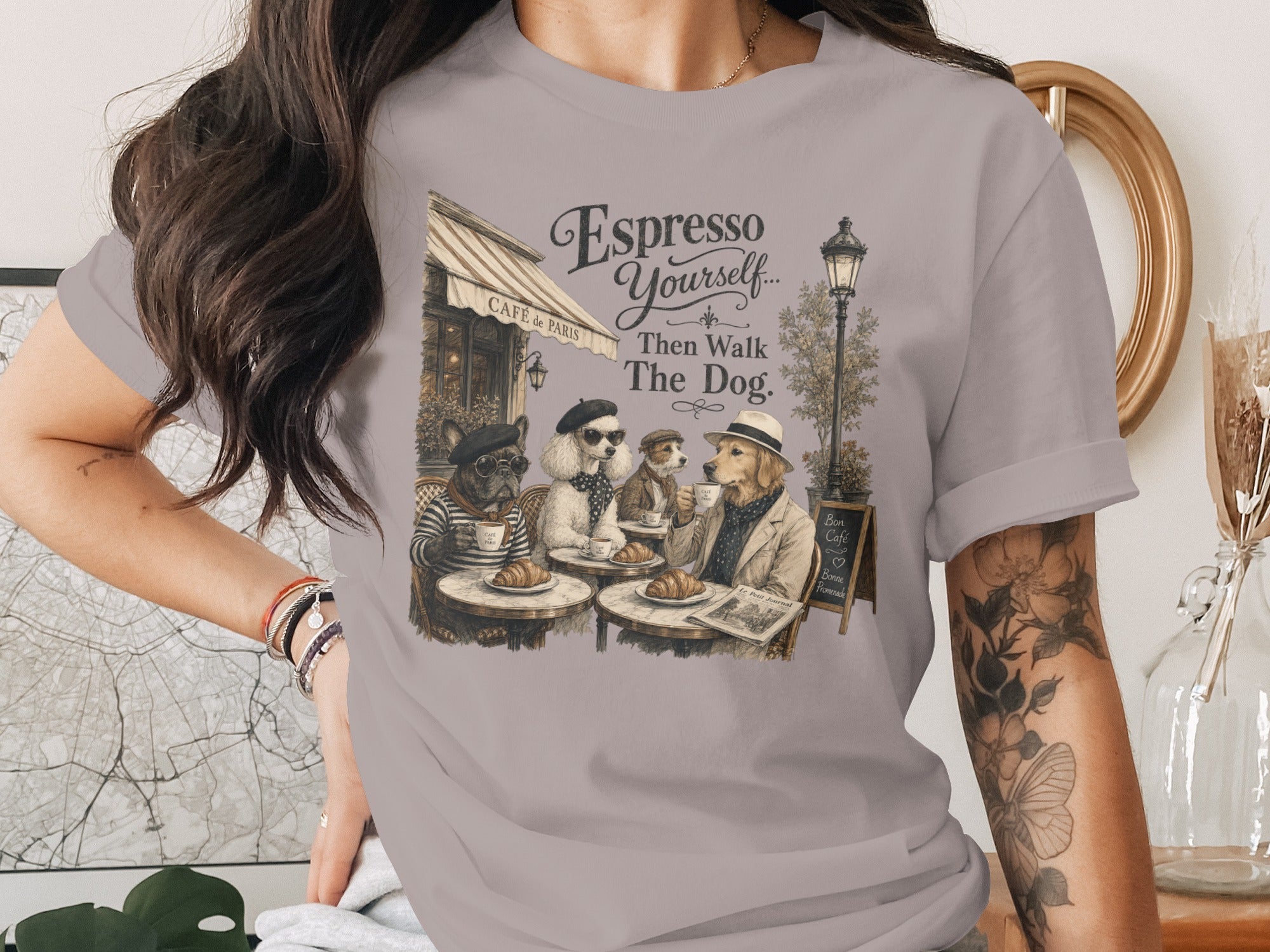 Dogs in stylish clothing sitting at a cafe with "Espresso Yourself" text.