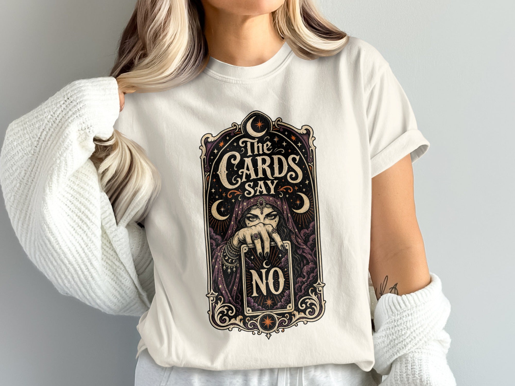 T-shirt graphic with fortune teller holding card that reads "The Cards Say No."