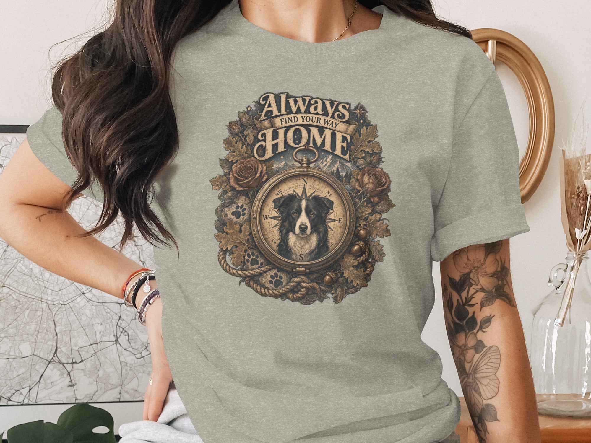 T-shirt graphic with dog, compass, and text "Always Find Your Way Home."