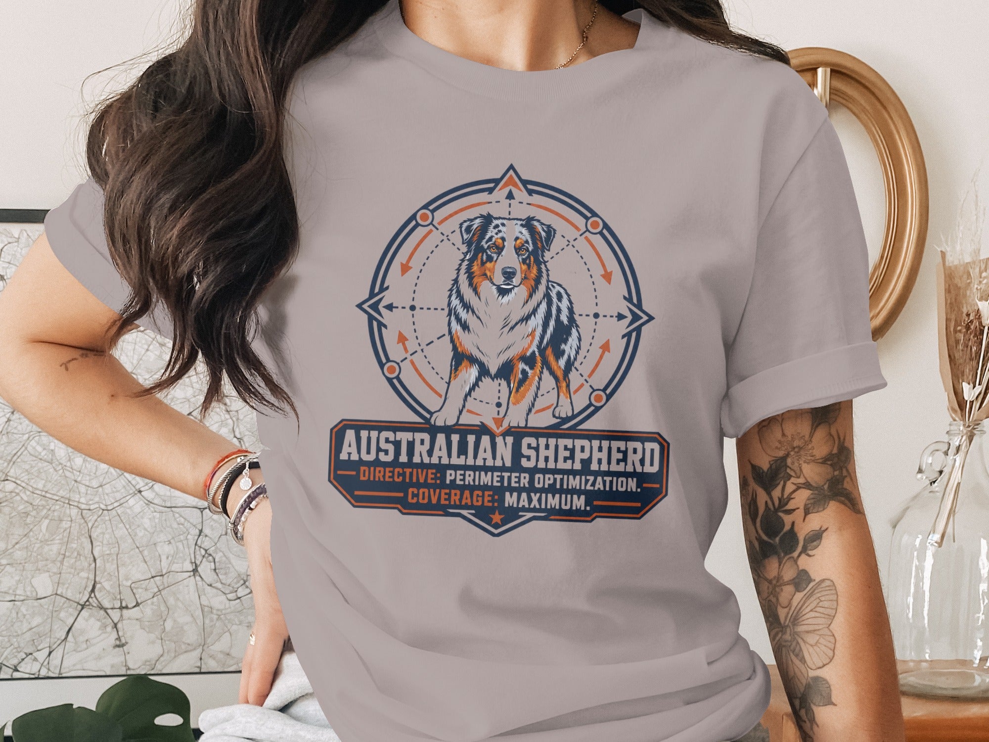 T-shirt with Australian Shepherd graphic and text "DIRECTIVE: PERIMETER OPTIMIZATION. COVERAGE: MAXIMUM."