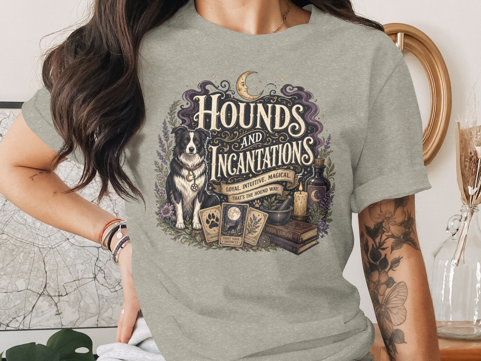 T-shirt with "Hounds and Incantations" text, dog, tarot cards, and potion.
