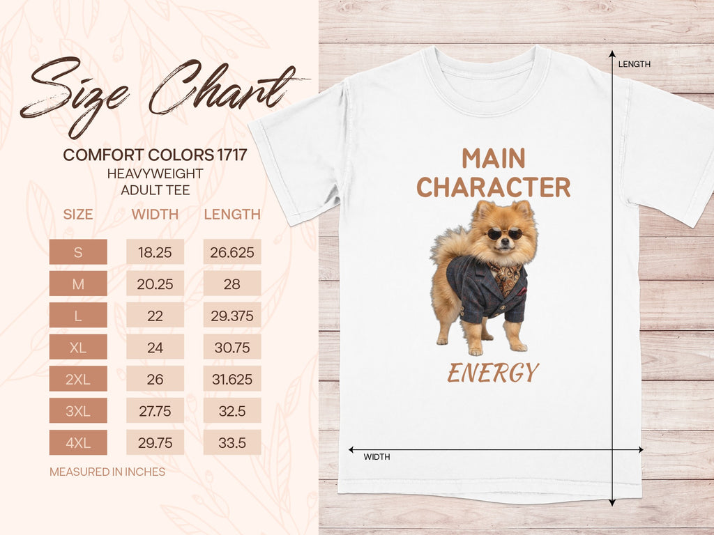 Size chart and white t-shirt with "Main Character Energy" and a Pomeranian dog.