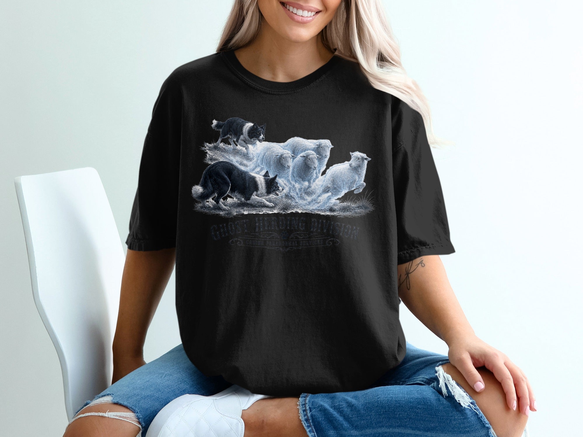 Black t-shirt with "Ghost Herding Division" graphic of dogs herding sheep.