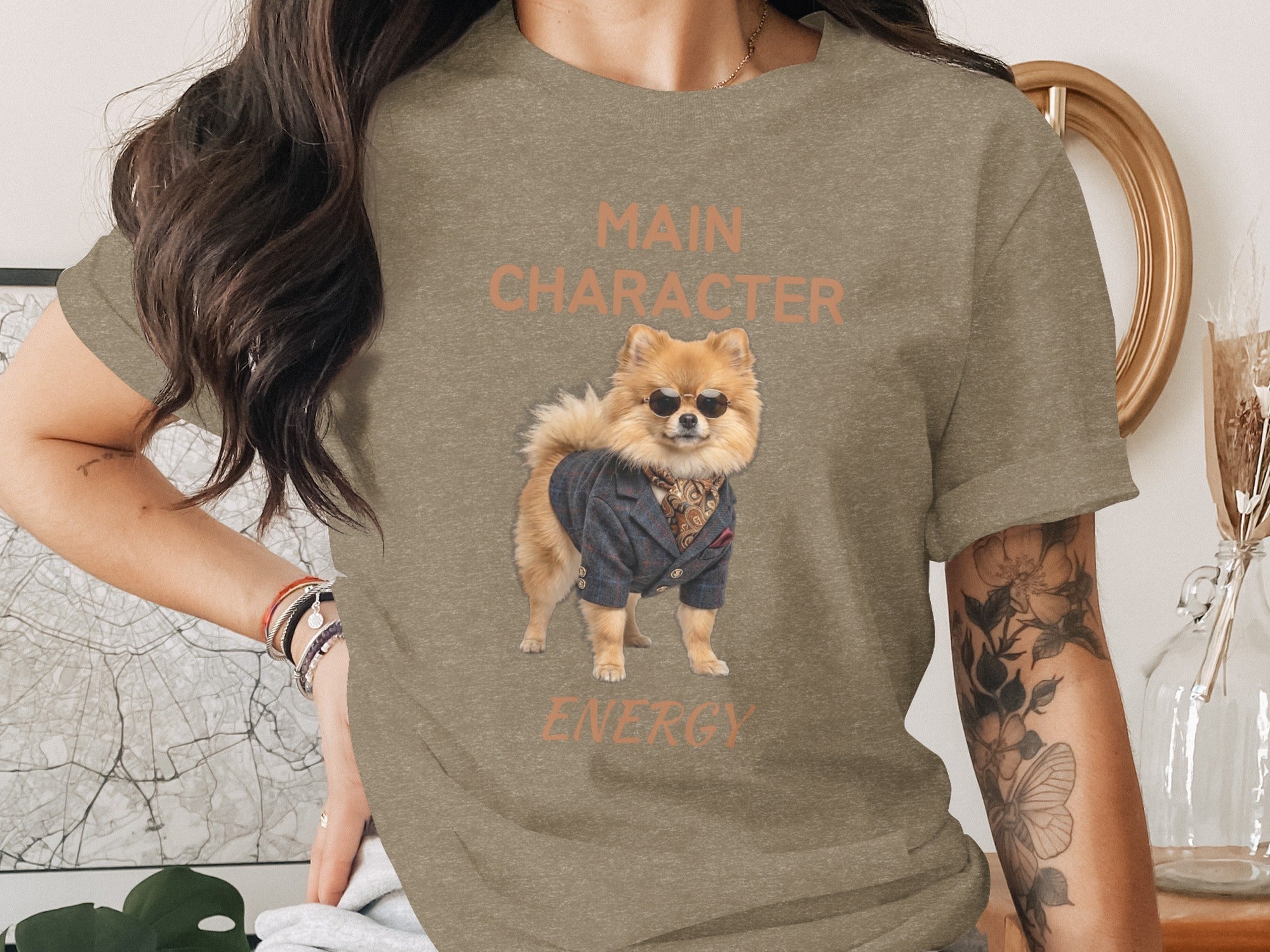 T-shirt graphic with a dog wearing sunglasses and a suit, saying "Main Character Energy".