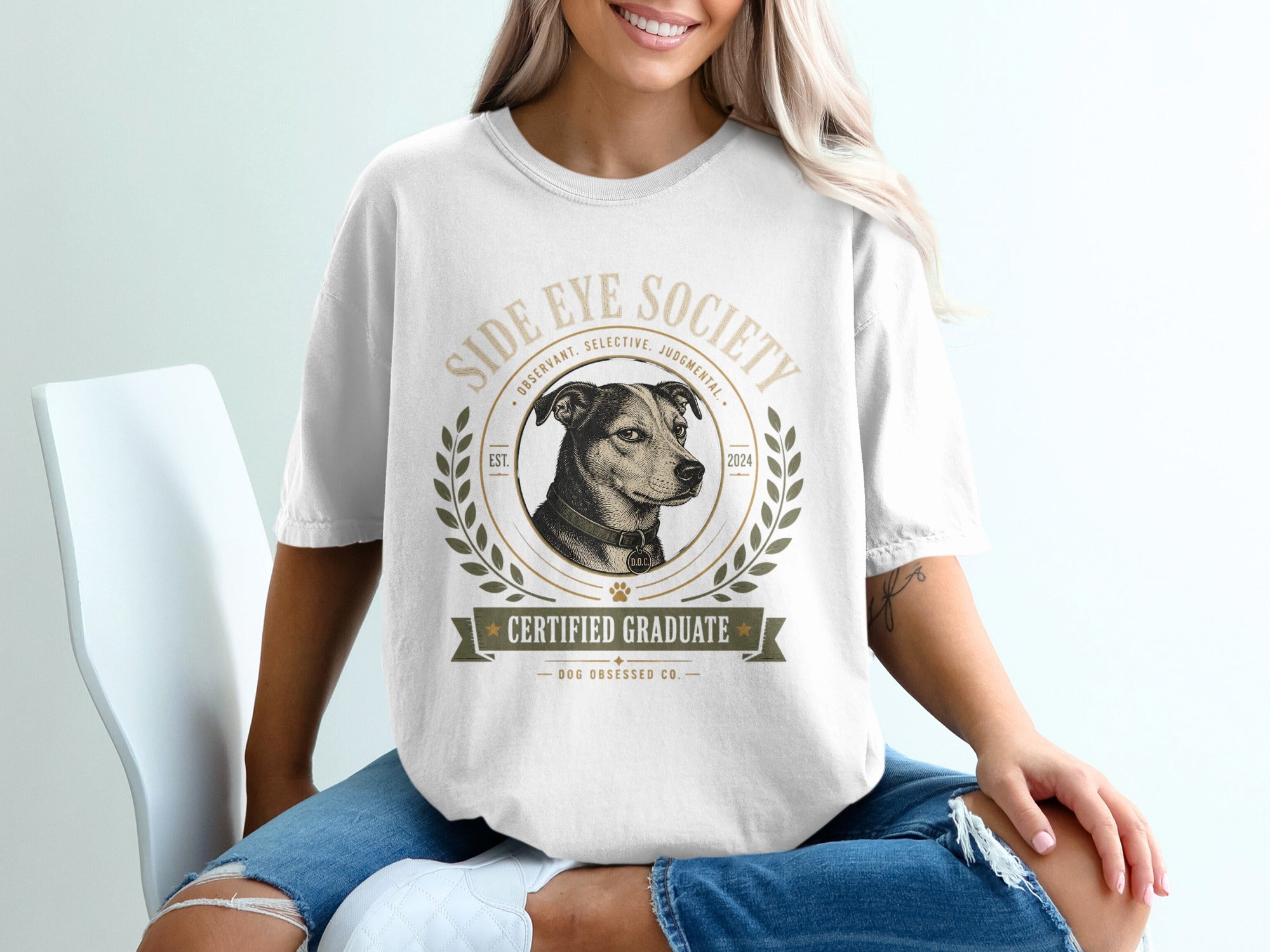 White t-shirt with dog graphic and text "Side Eye Society Certified Graduate Dog Obsessed Co."