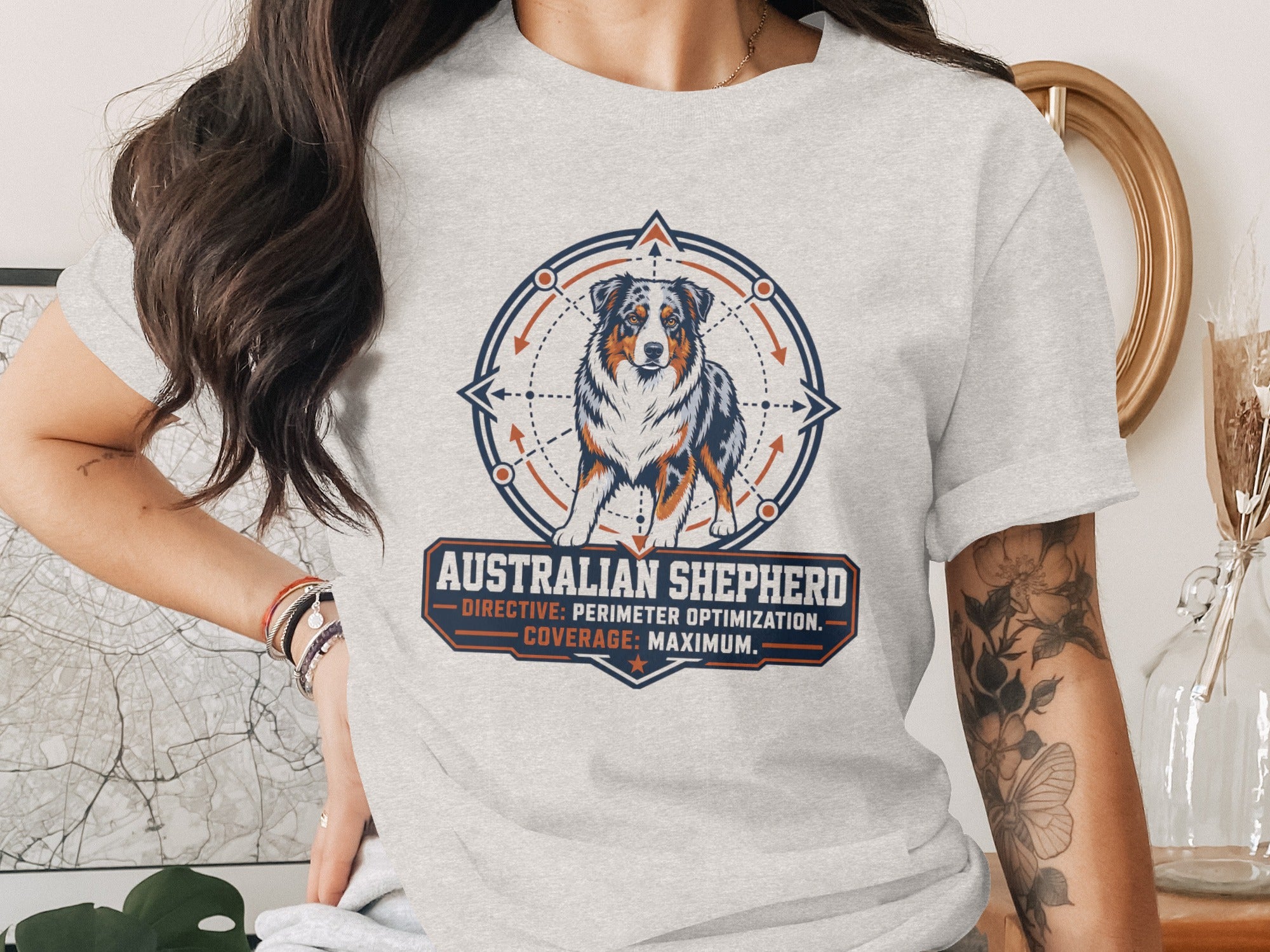 Australian Shepherd dog graphic with text on a light grey t-shirt.