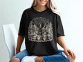 Black t-shirt with vintage "Properly Chaperoned" text and dogs illustration design.
